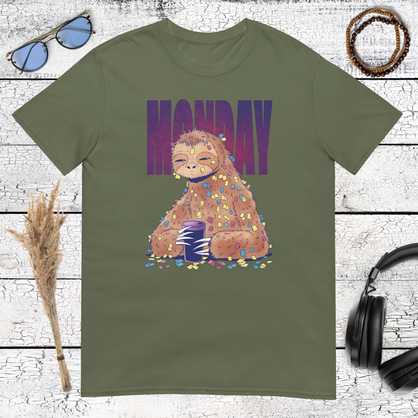 Rugged style graphic of a sleepy sloth for work-week humor on a military green t-shirt
