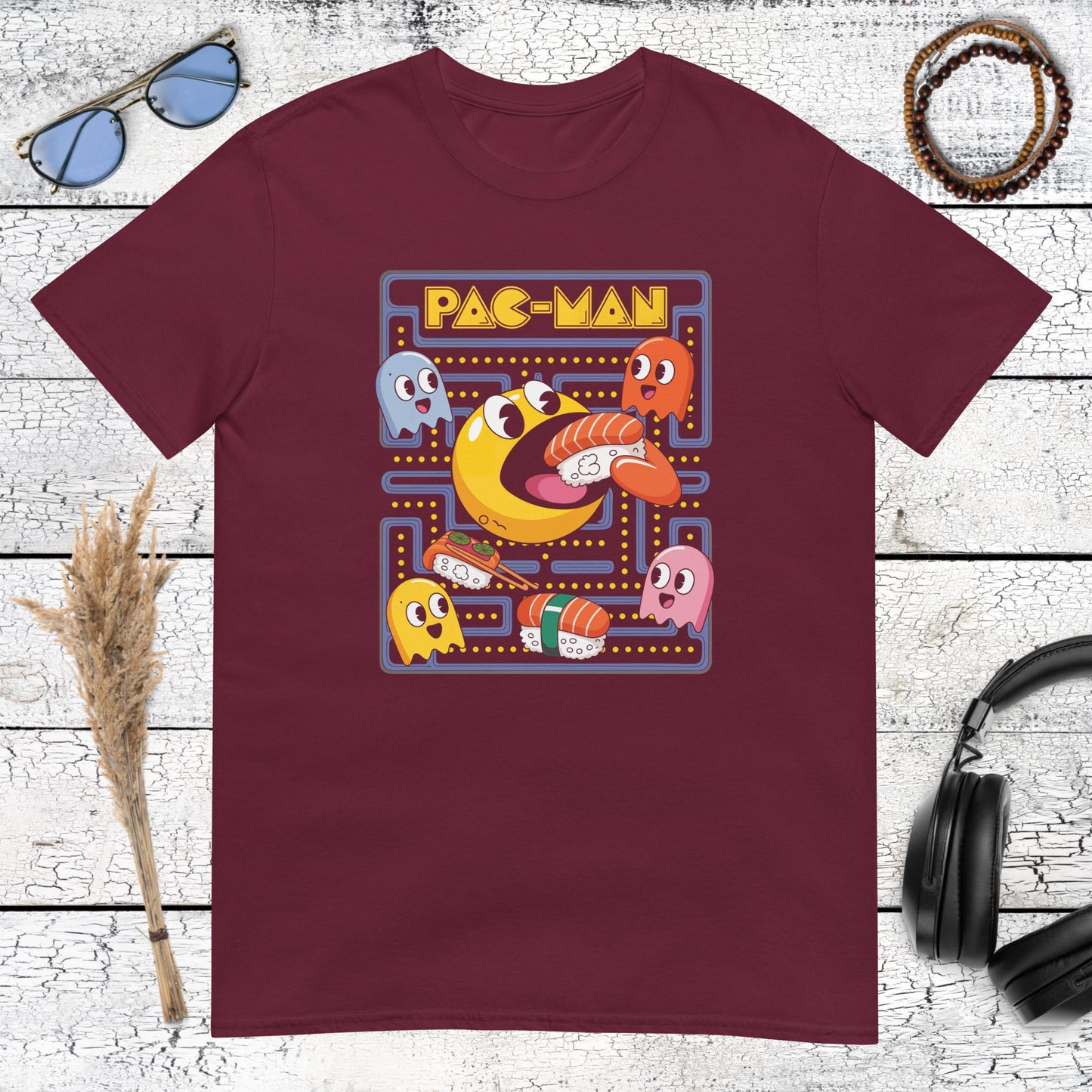 Colorful Japanese food and retro arcade graphic on a maroon t-shirt