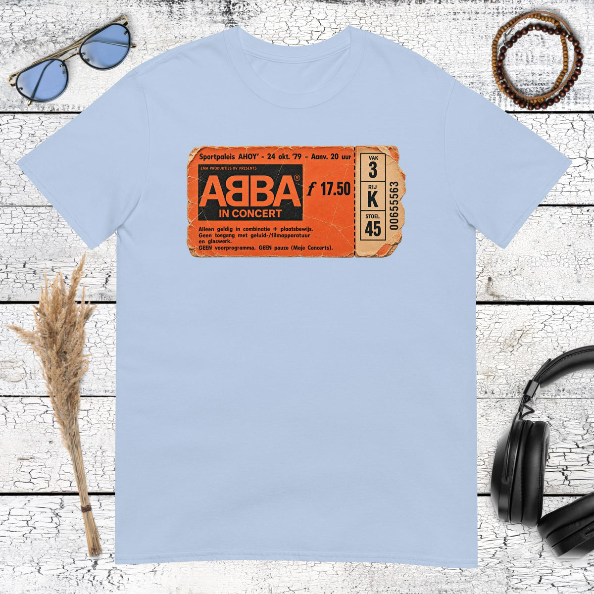 Vintage ABBA logo graphic printed on a light blue t-shirt
