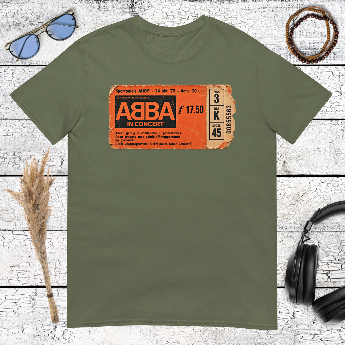 Retro ABBA logo artwork printed on a military green t-shirt