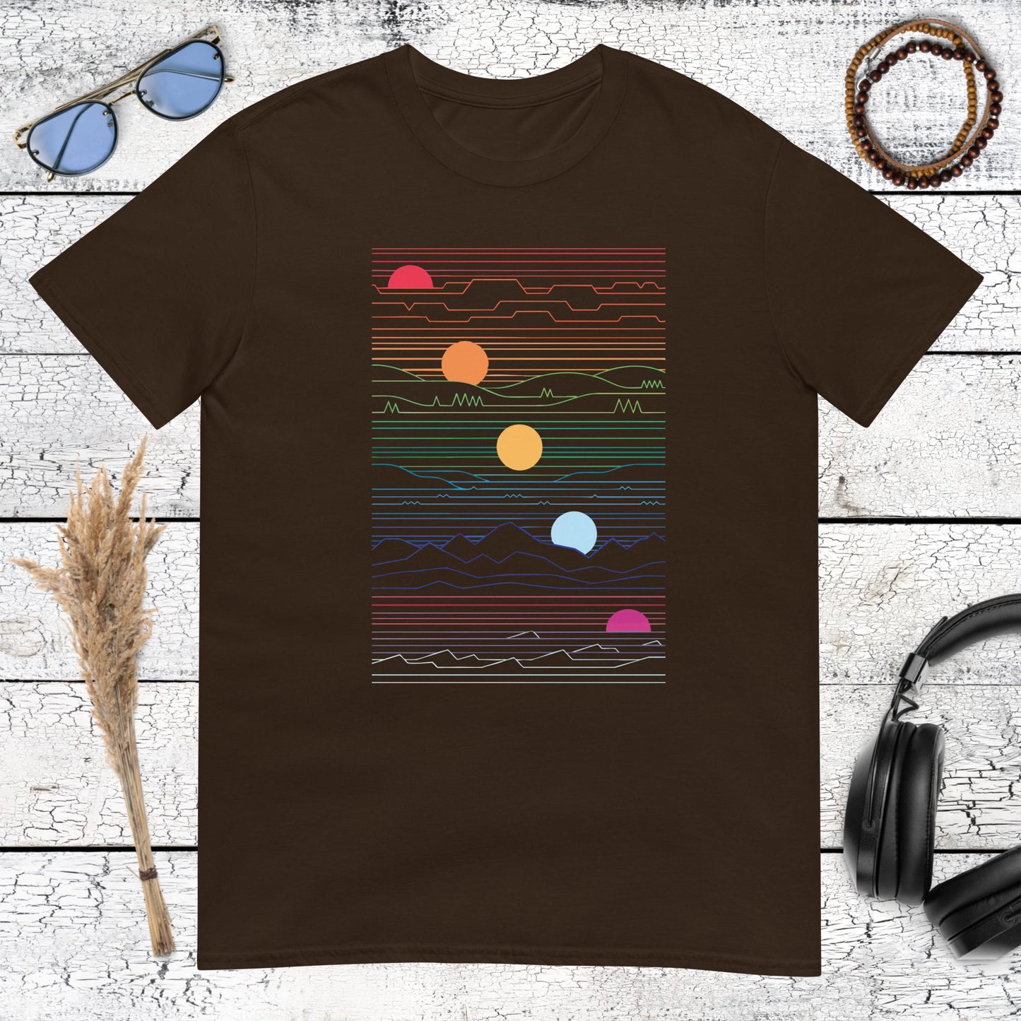 Retro 80s 90s style geometric sun illustration on dark chocolate