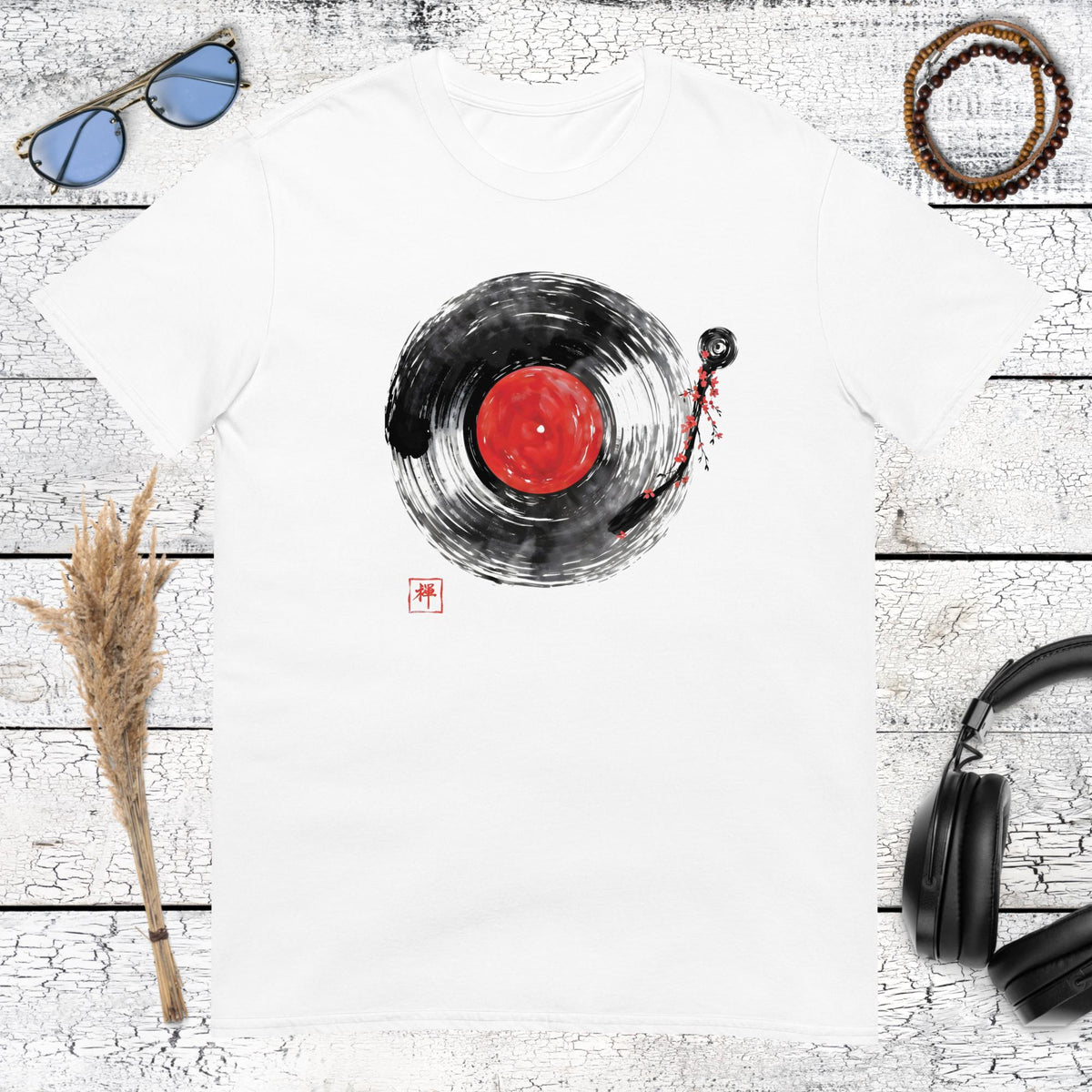 Minimalist black ink brush vinyl record graphic on a white t-shirt