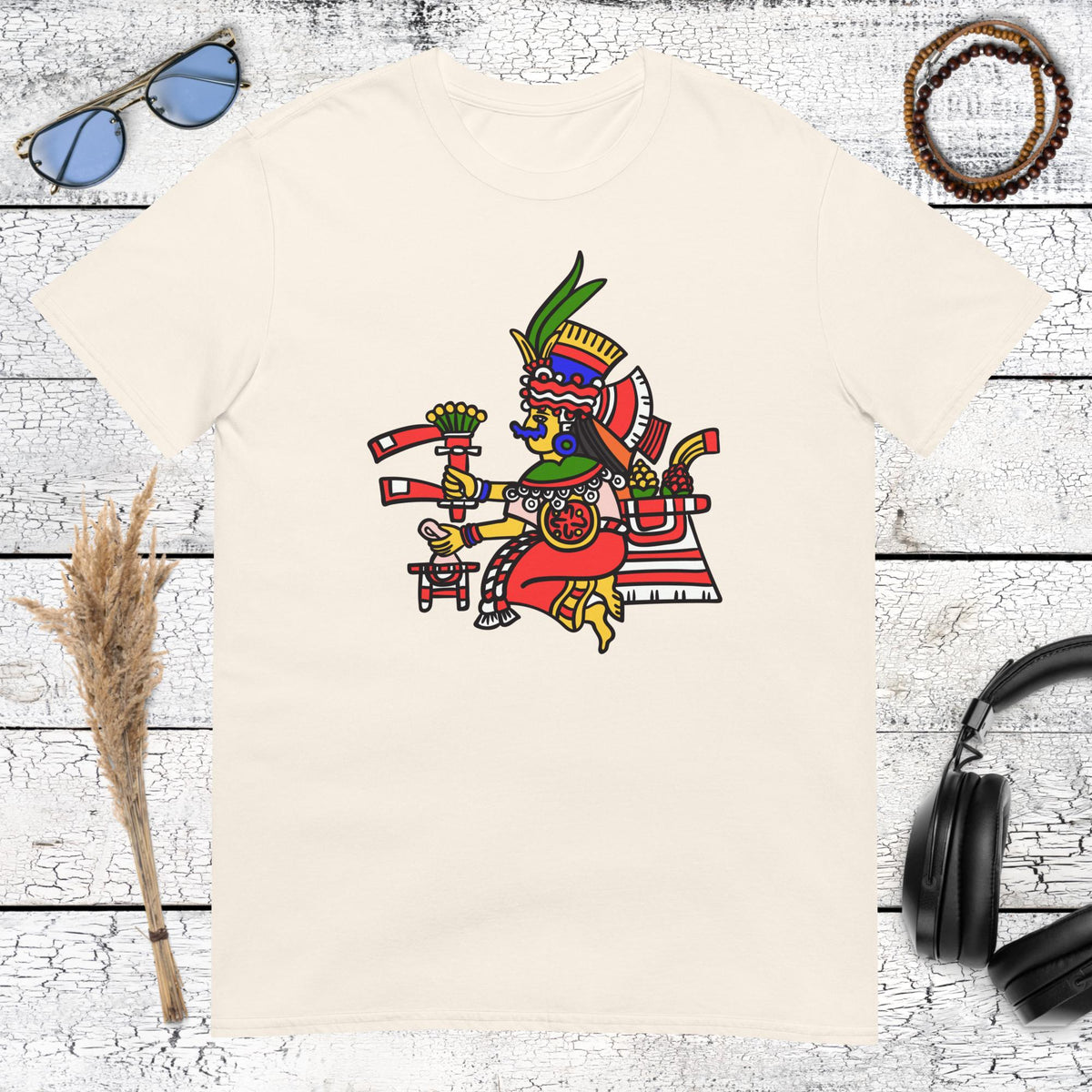 Traditional Aztec warrior graphic with colourful Mesoamerican details on a natural cotton t-shirt