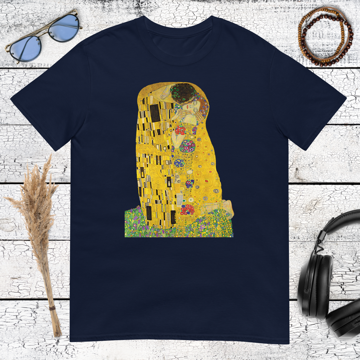 Classic fine art masterpiece The Kiss by Gustav Klimt printed on a navy blue cotton t-shirt