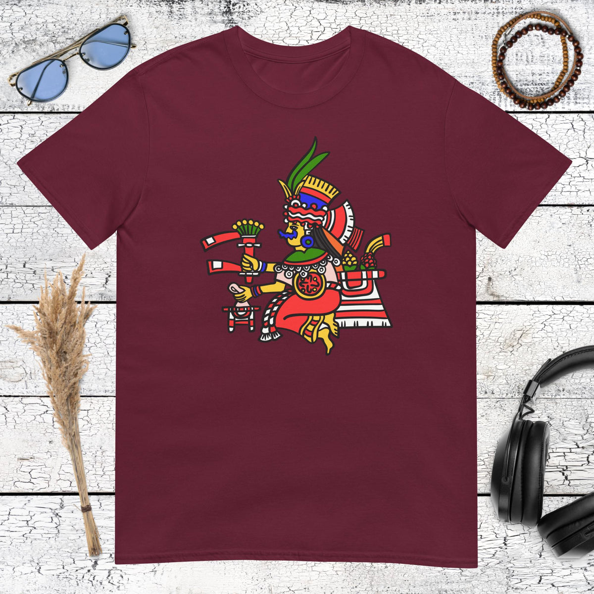 Detailed tribal Aztec warrior illustration printed on a maroon t-shirt