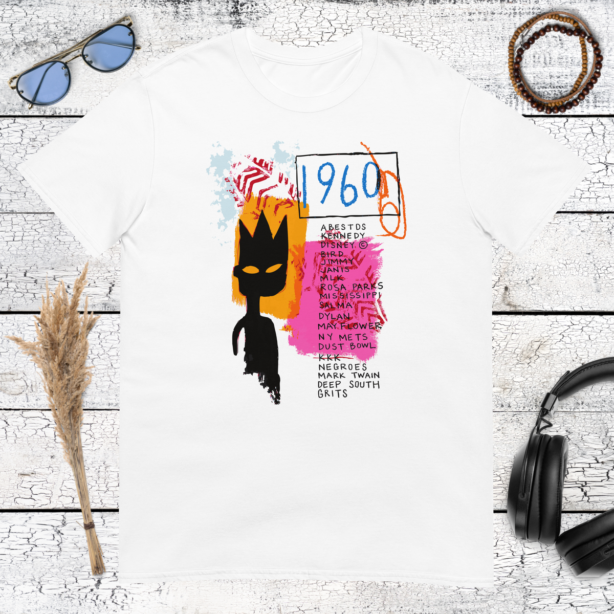 Abstract crowned portrait with graffiti-style marks and colourful details on a white t-shirt