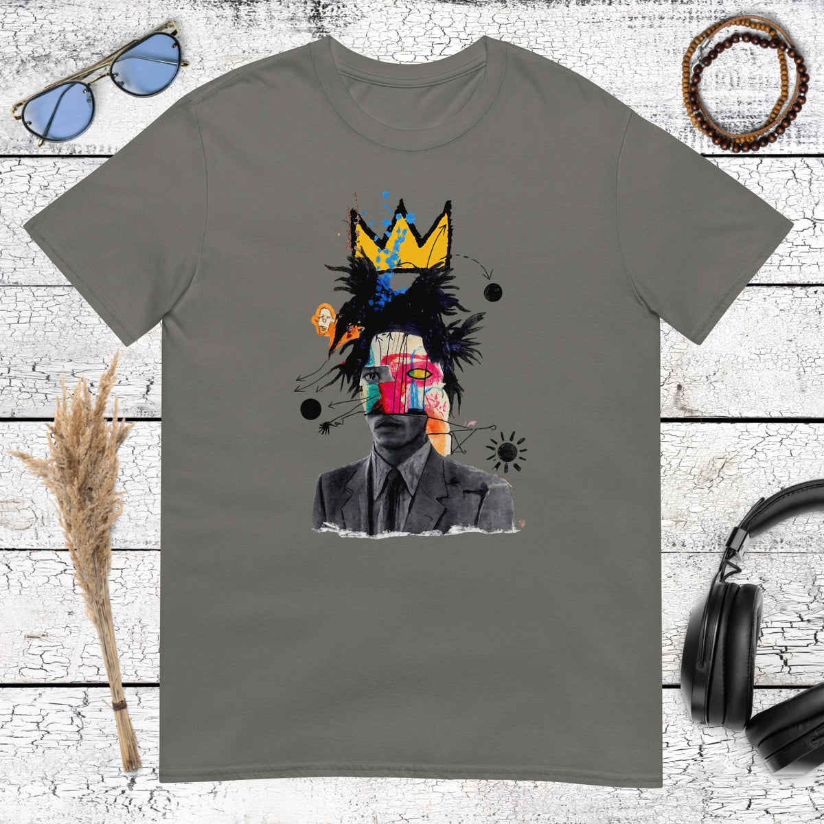 Expressive abstract crown portrait with graffiti-style details printed on a charcoal t-shirt