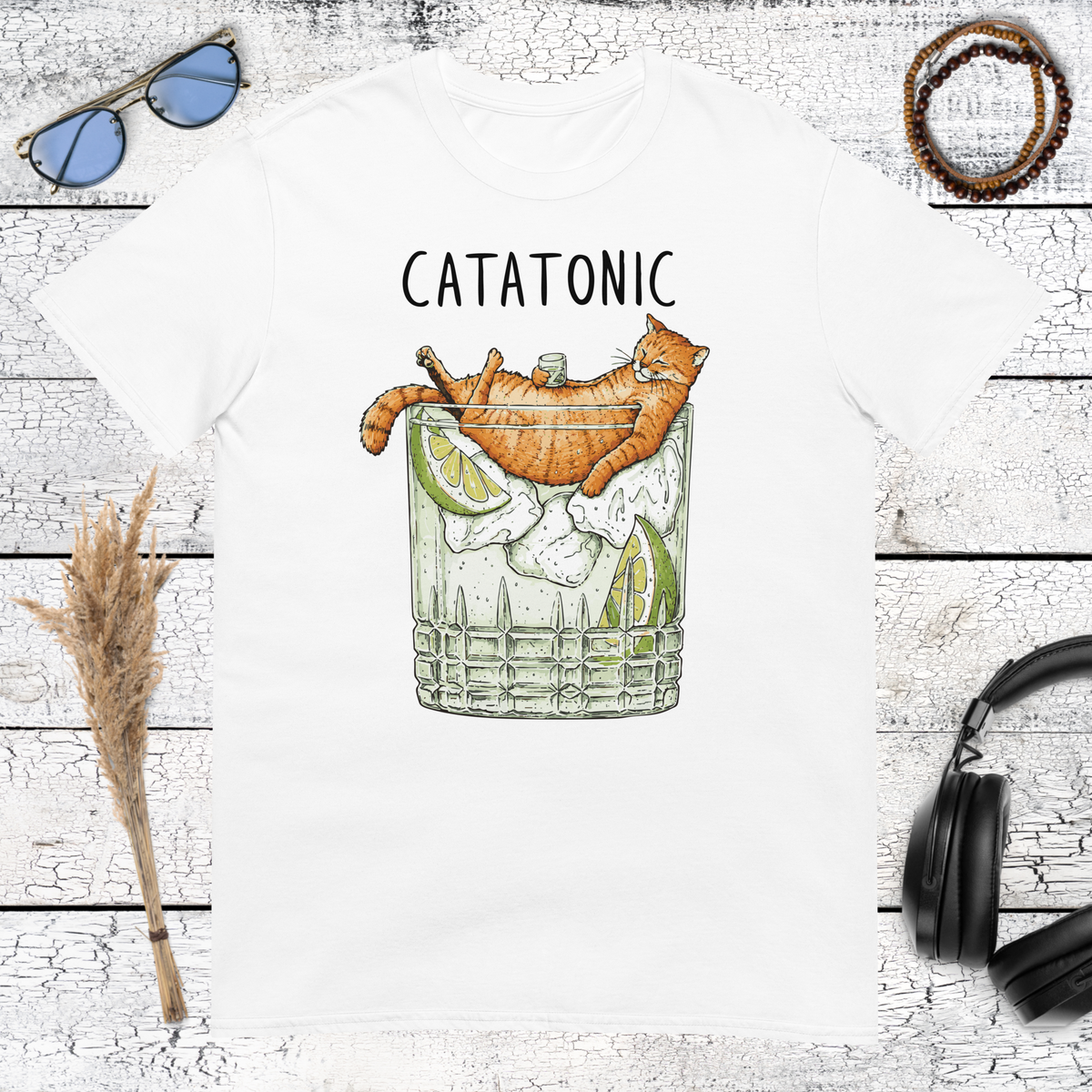 Quirky orange cat cocktail artwork with Catatonic text on a classic white t-shirt