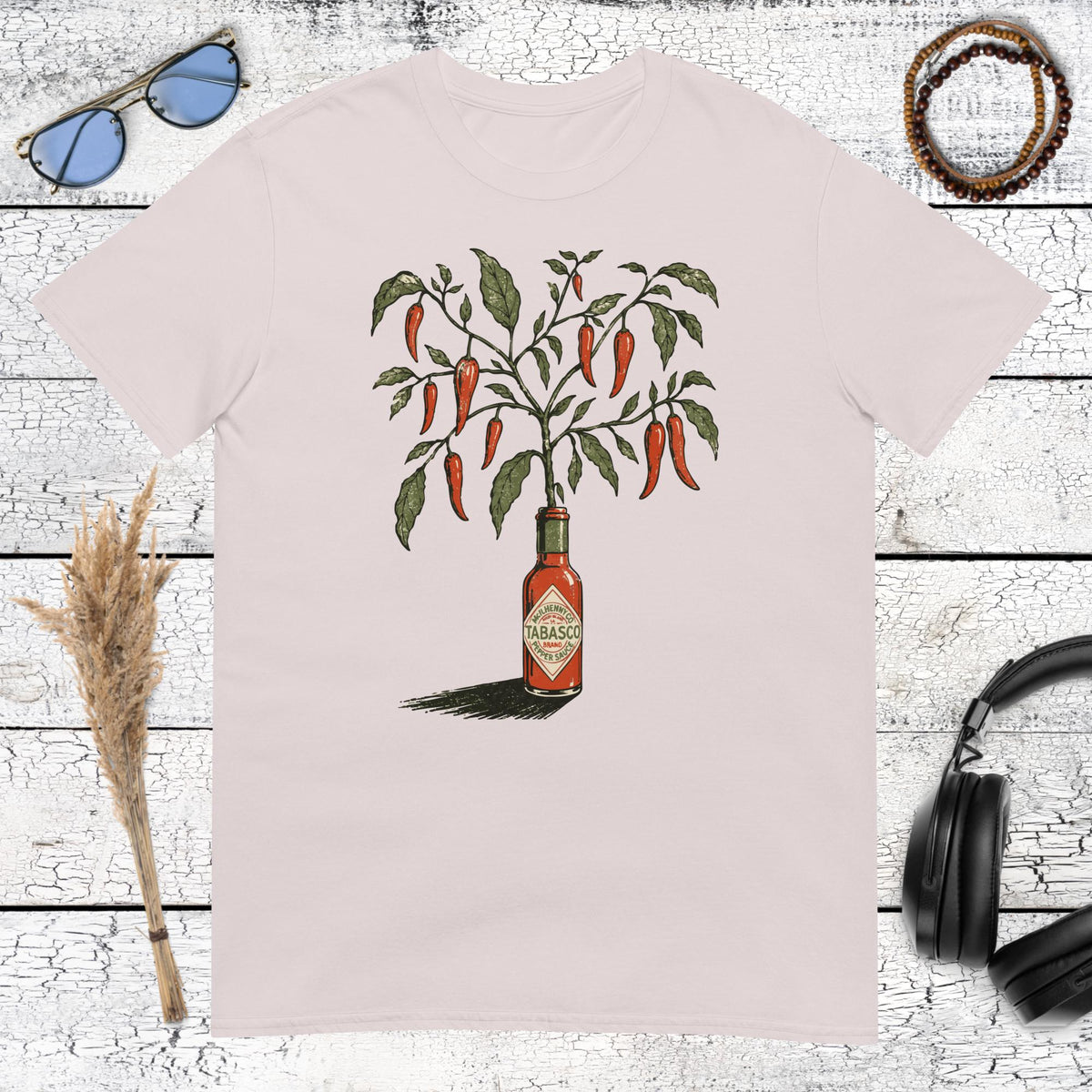 Botanical hot sauce bottle and red chili peppers graphic on an ice grey t-shirt