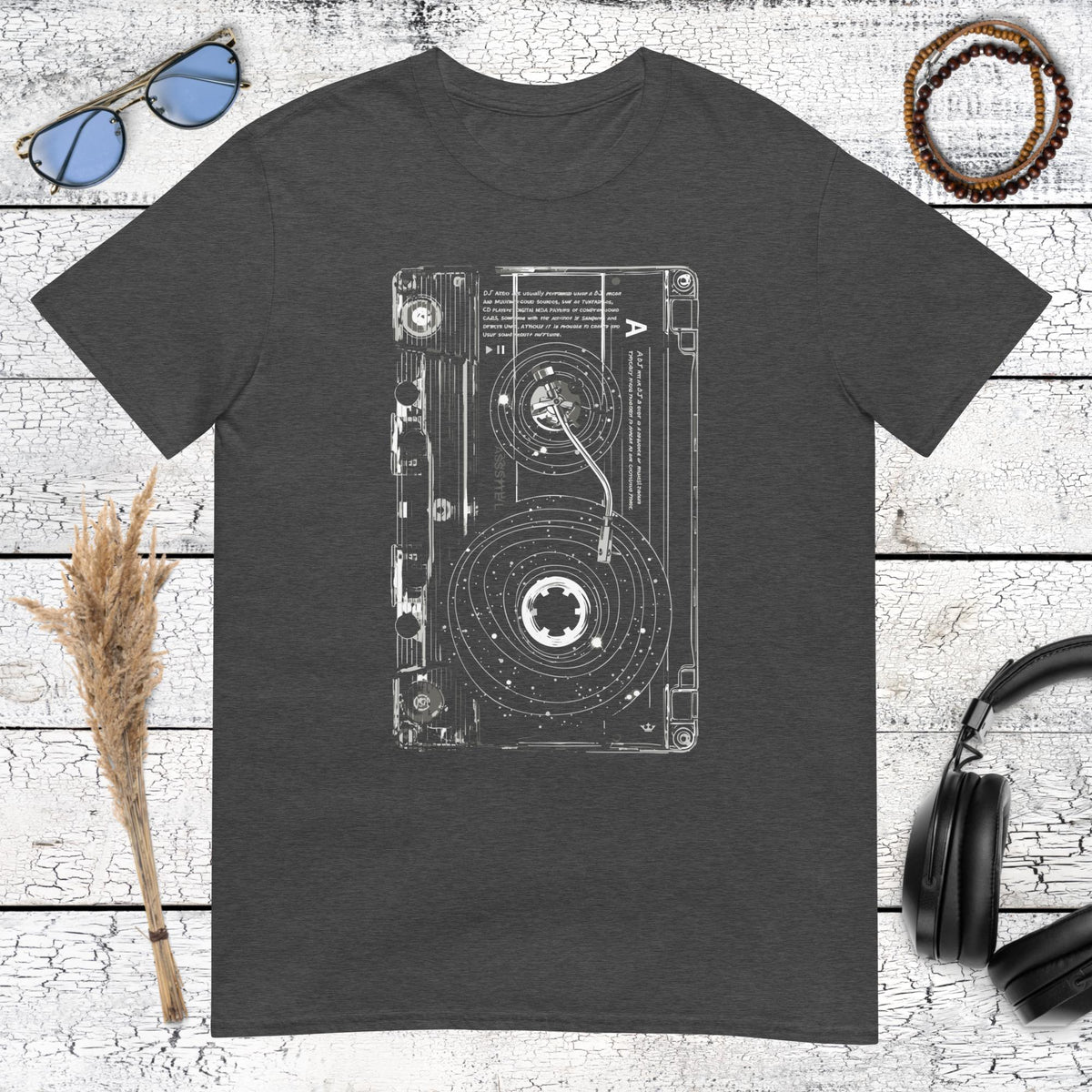 White ink cassette tape outline on a dark heather grey t-shirt