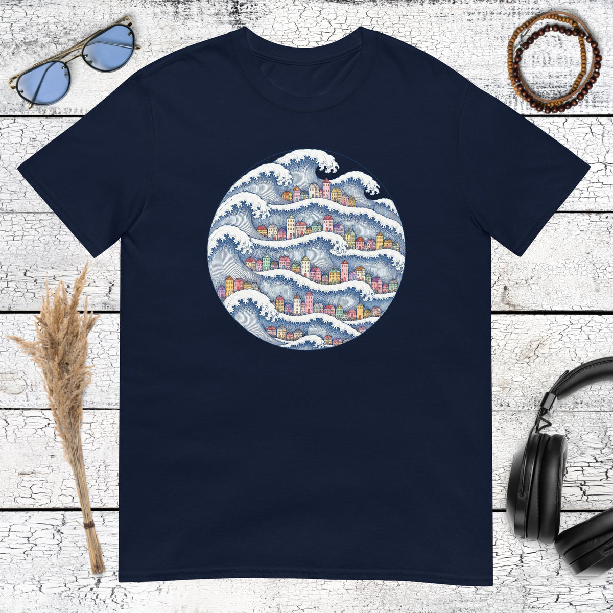 Japanese-inspired coastal wave and village graphic printed on a navy blue t-shirt