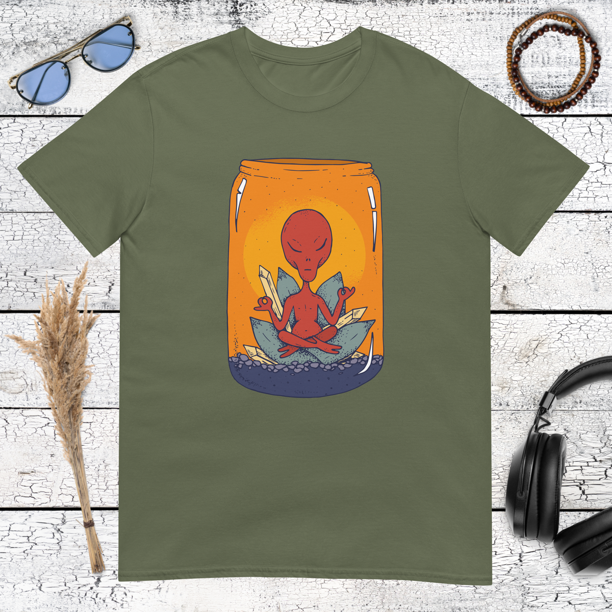 Military green t-shirt with a zen meditating alien in a jar illustration