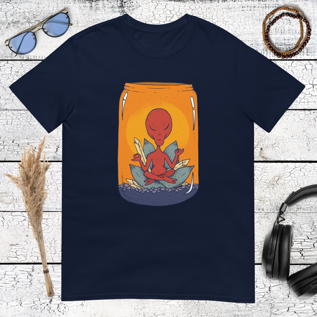 Aesthetic meditating alien graphic inside a glass jar on navy shirt