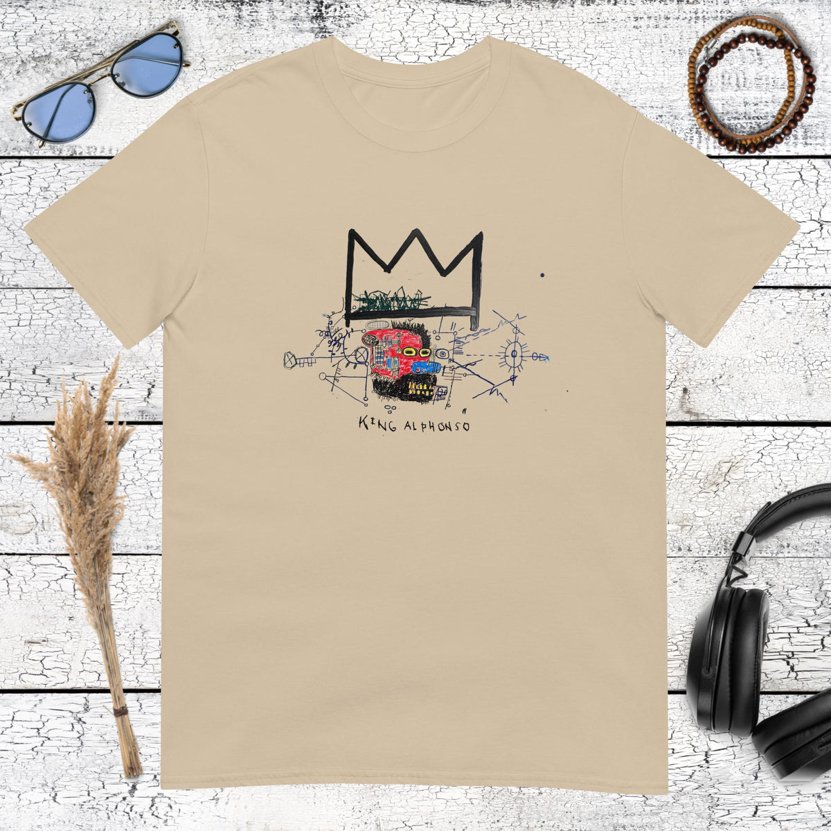 Basquiat-inspired crown skull artwork printed on a sand t-shirt