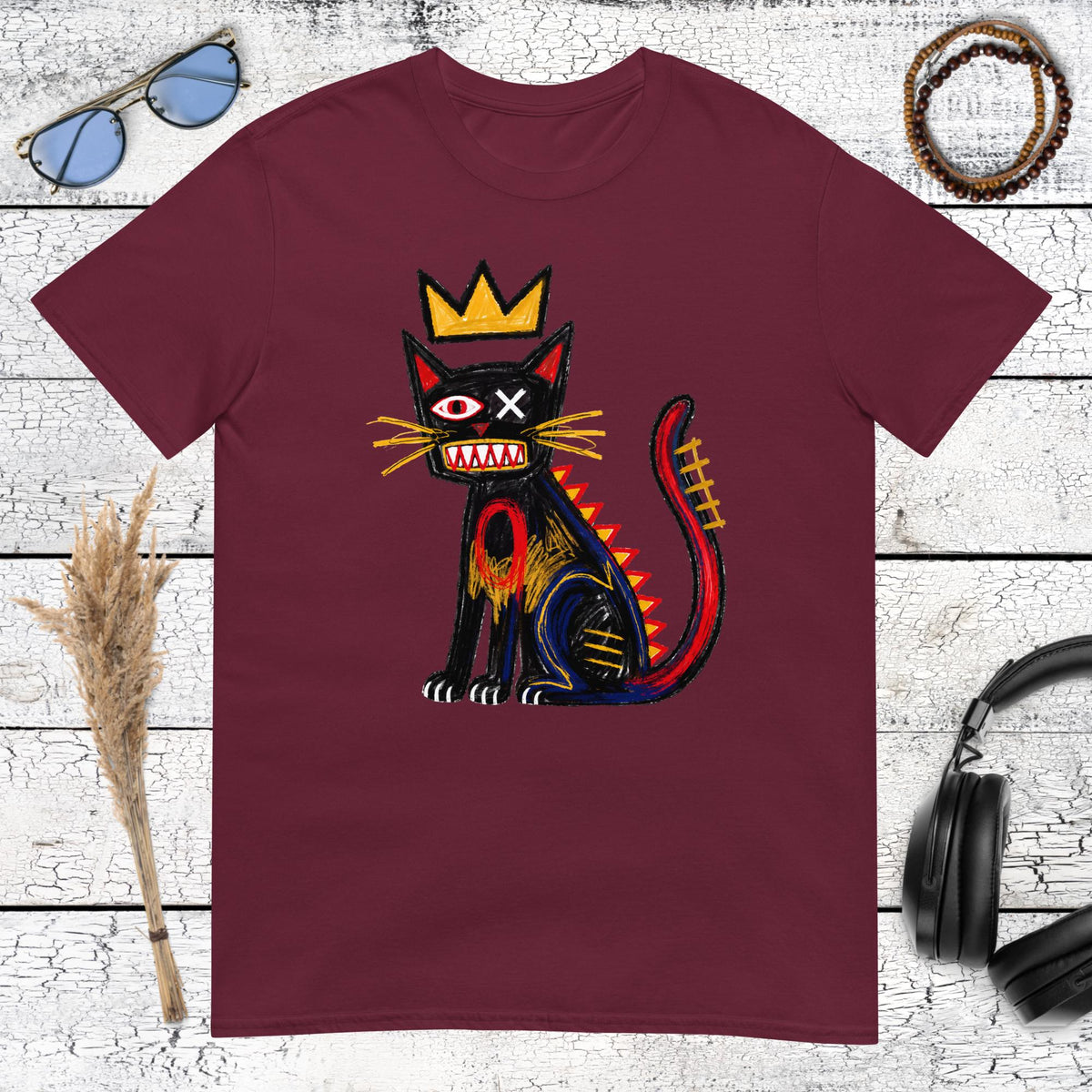 Colourful crowned cat graphic printed on a maroon t-shirt