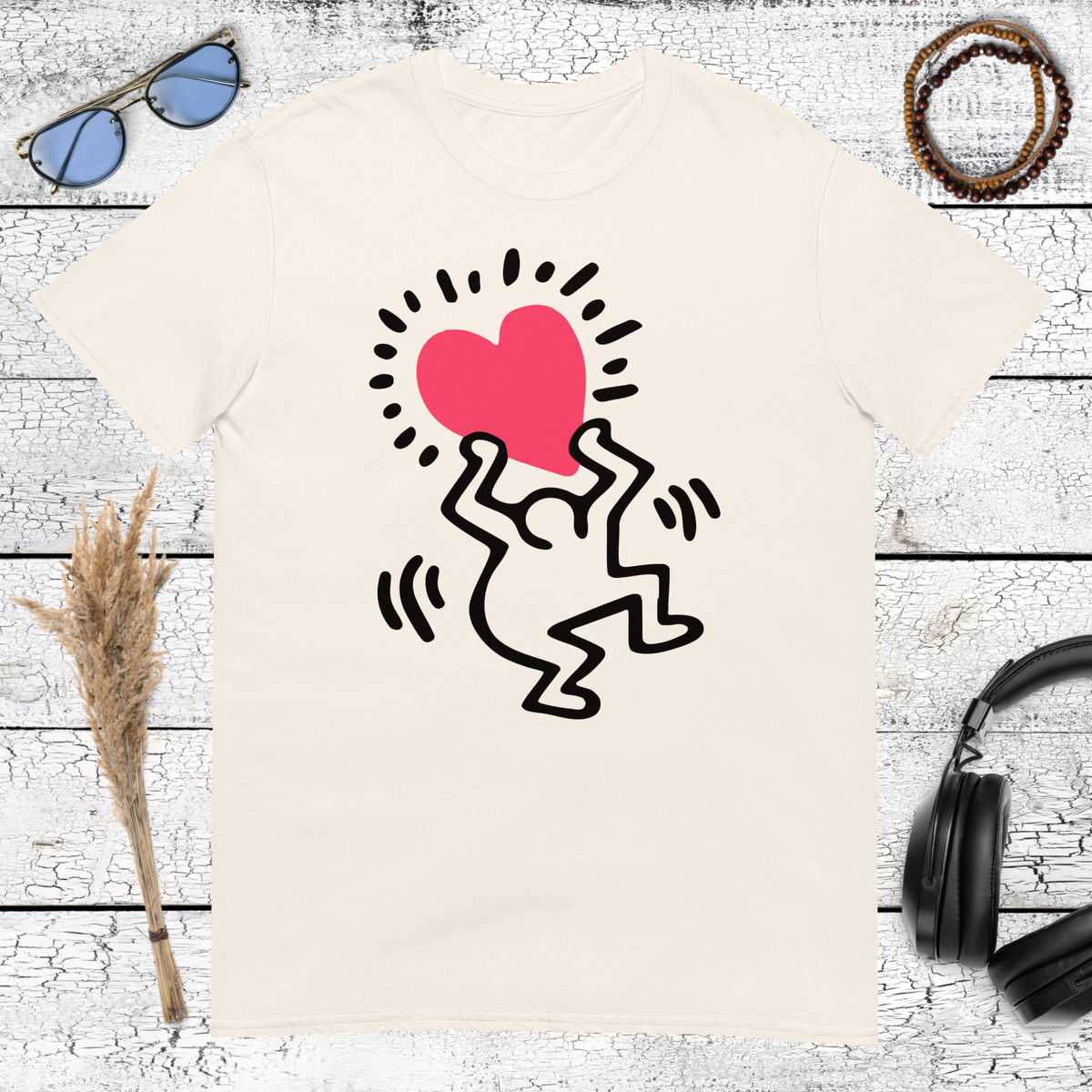 Keith Haring-inspired heart and dancing figures graphic printed on a natural cotton t-shirt