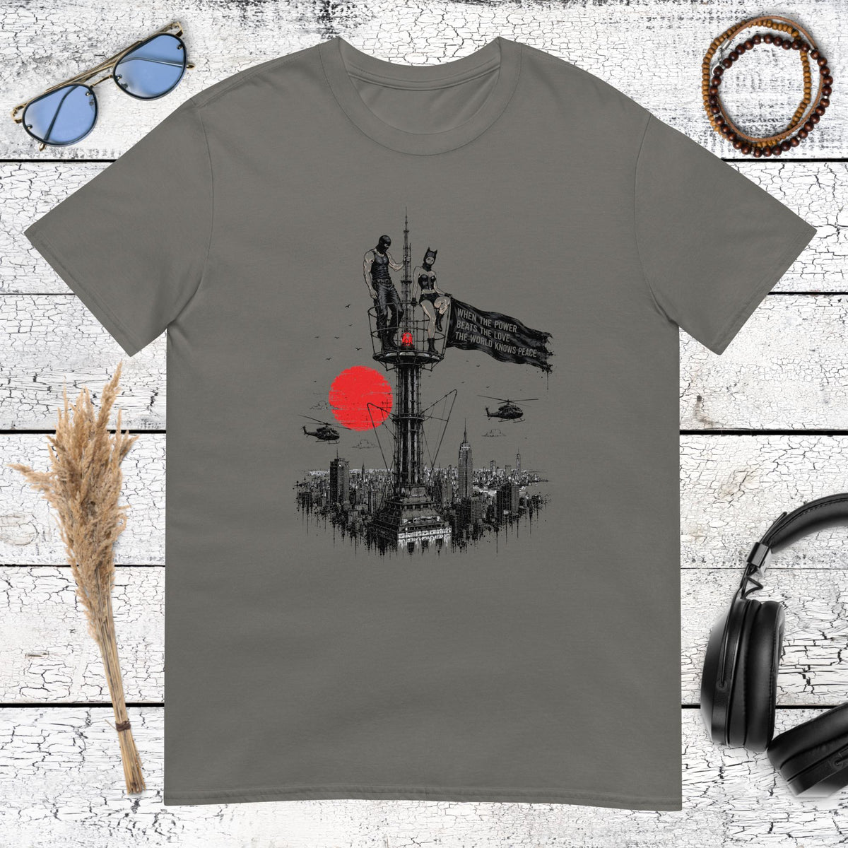 Moody city skyline illustration with giant cat on charcoal grey shirt