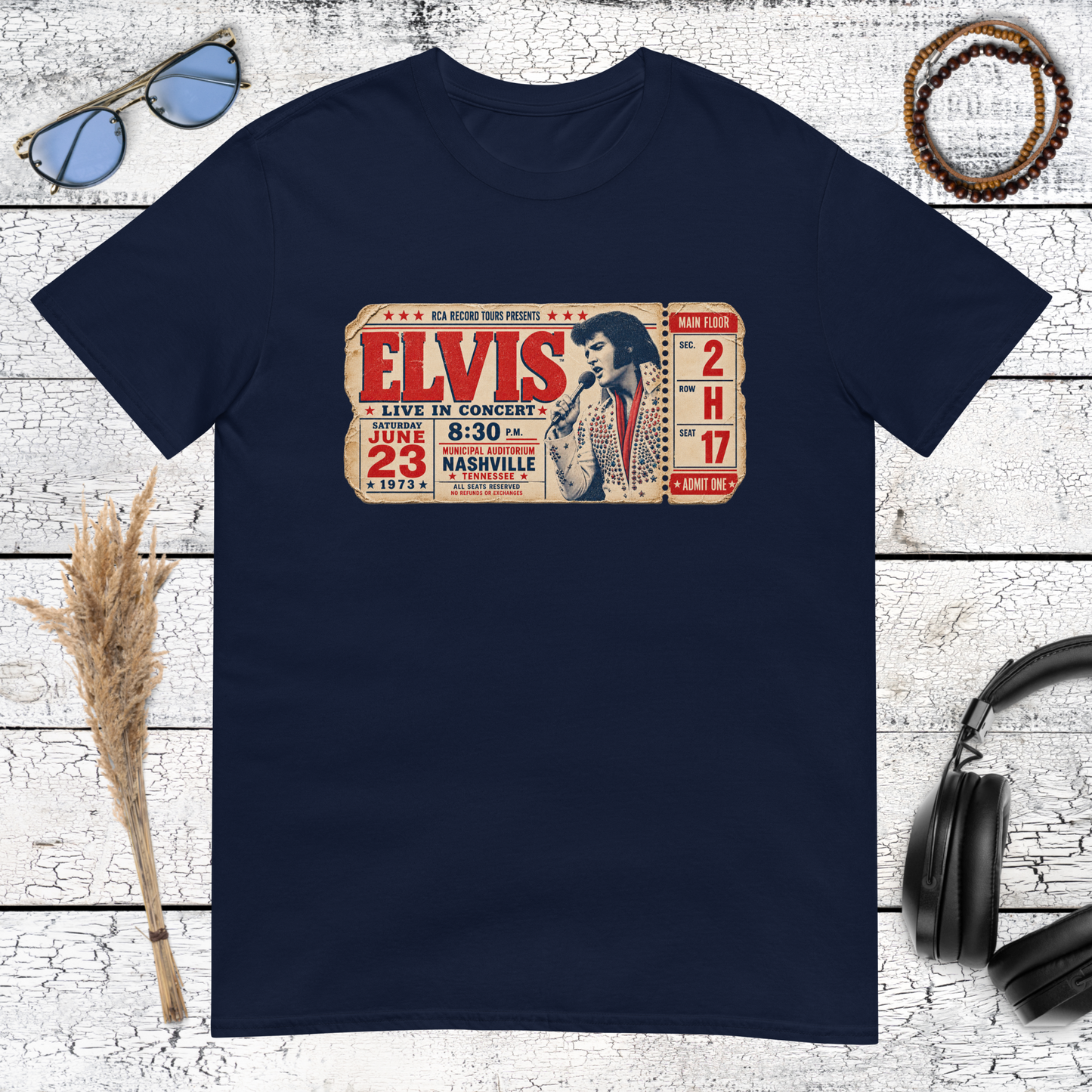 Retro Elvis concert ticket artwork printed on a navy blue t-shirt