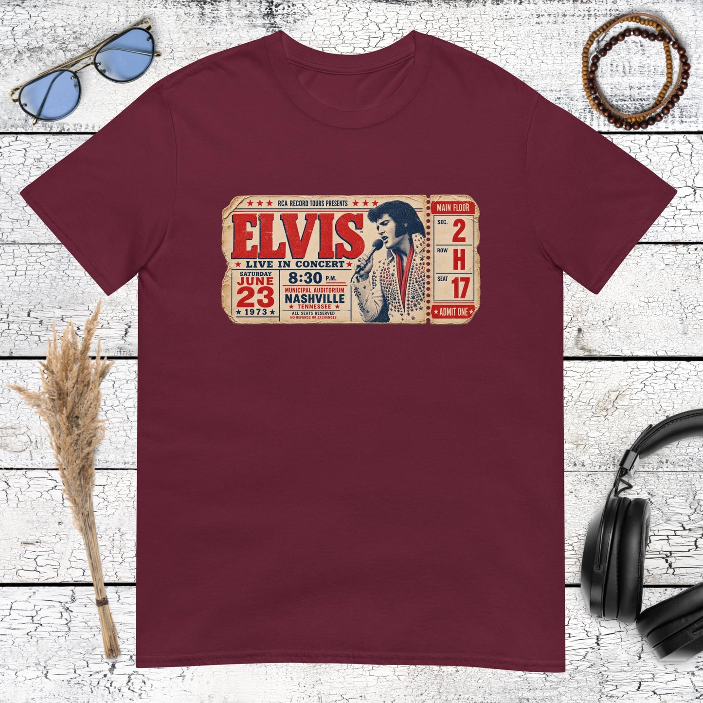 Vintage Elvis concert ticket artwork printed on a maroon t-shirt