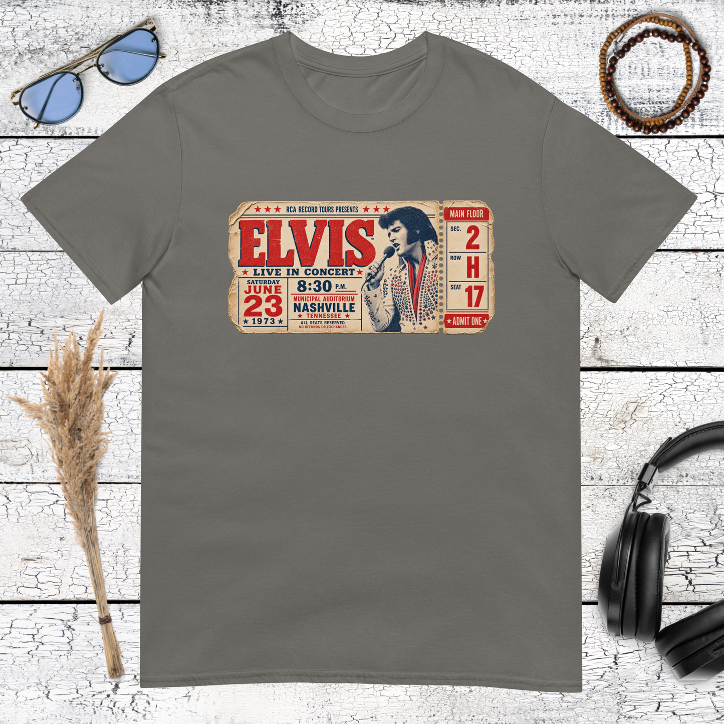 Vintage Elvis music ticket graphic with red and cream details on a charcoal t-shirt