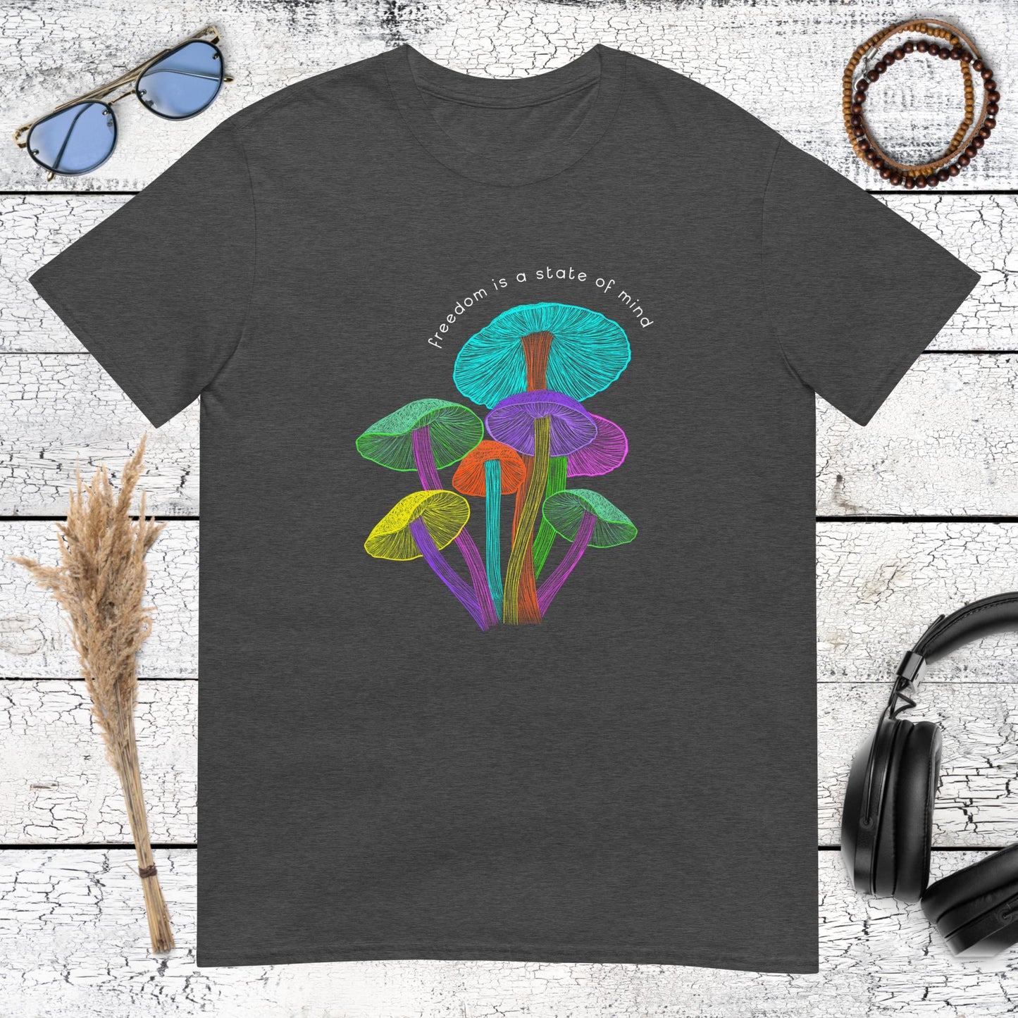 Detailed psychedelic fungi graphic with inspirational quote on a dark heather grey t-shirt