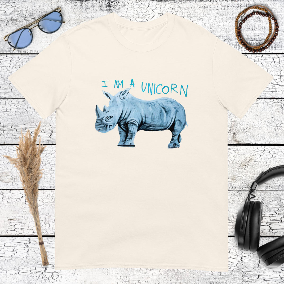 Sarcastic rhinoceros drawing with whimsical unicorn quote on a natural cotton t-shirt