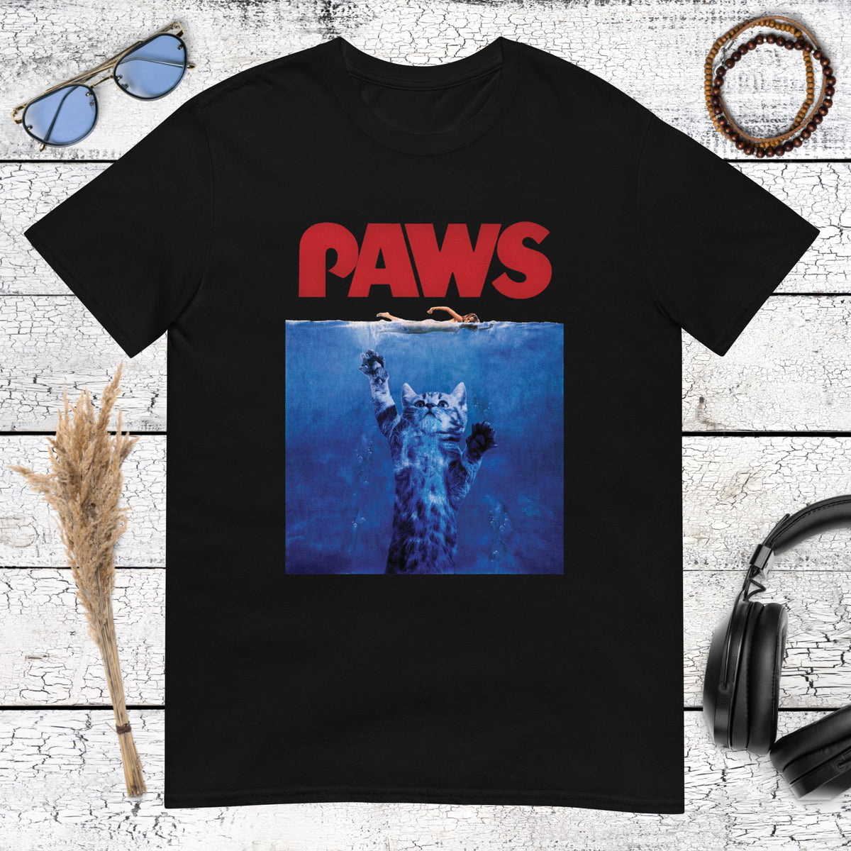 PAWS parody poster graphic with animal artwork on a black t-shirt