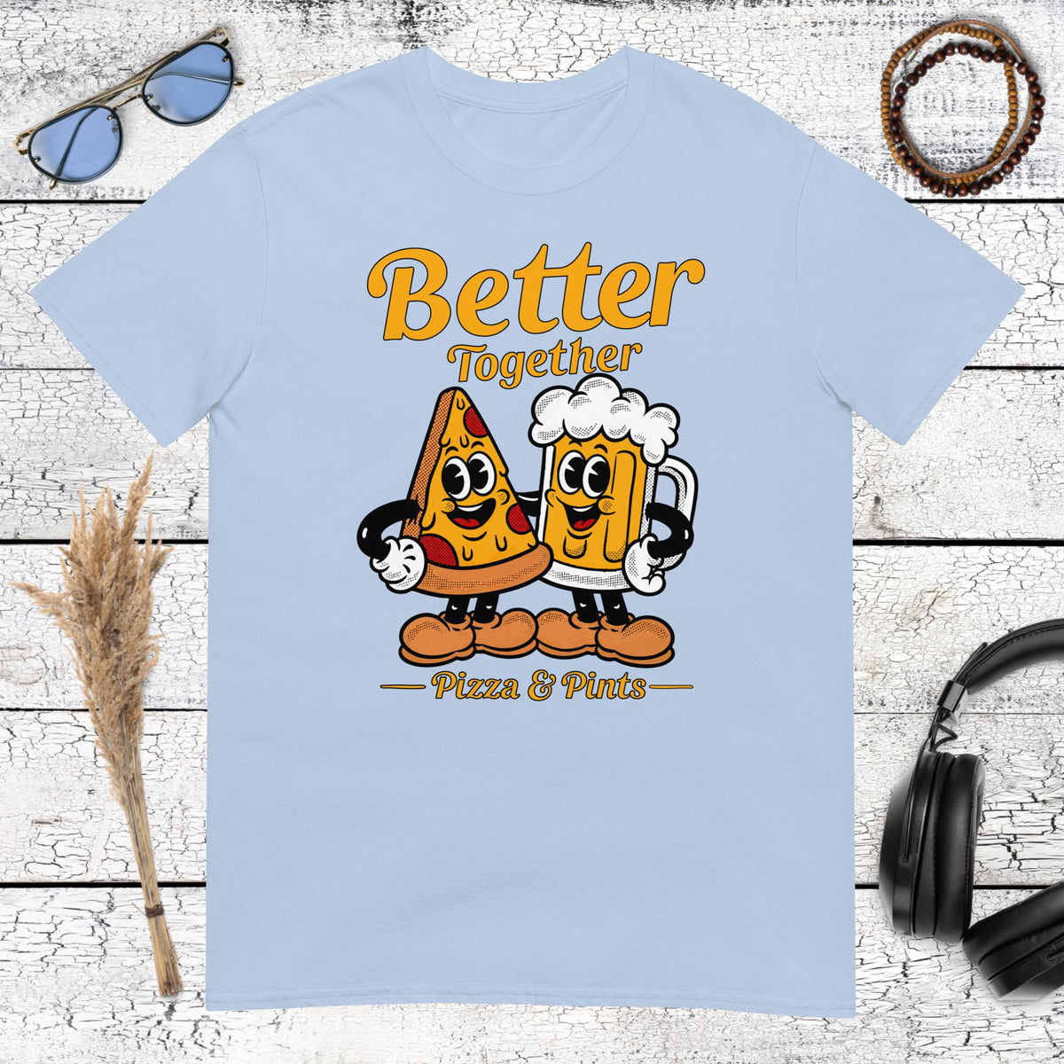 Cheerful pizza and beer illustration with retro lettering on a light blue t-shirt