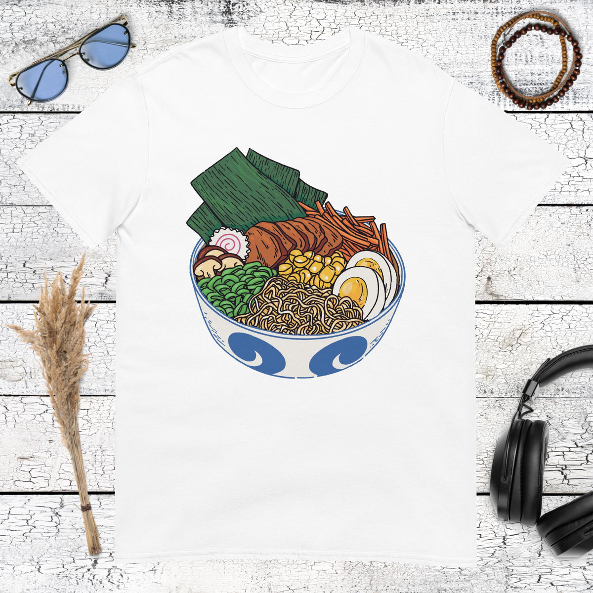 Colorful Japanese ramen bowl with egg, nori, meat and noodles on a white t-shirt