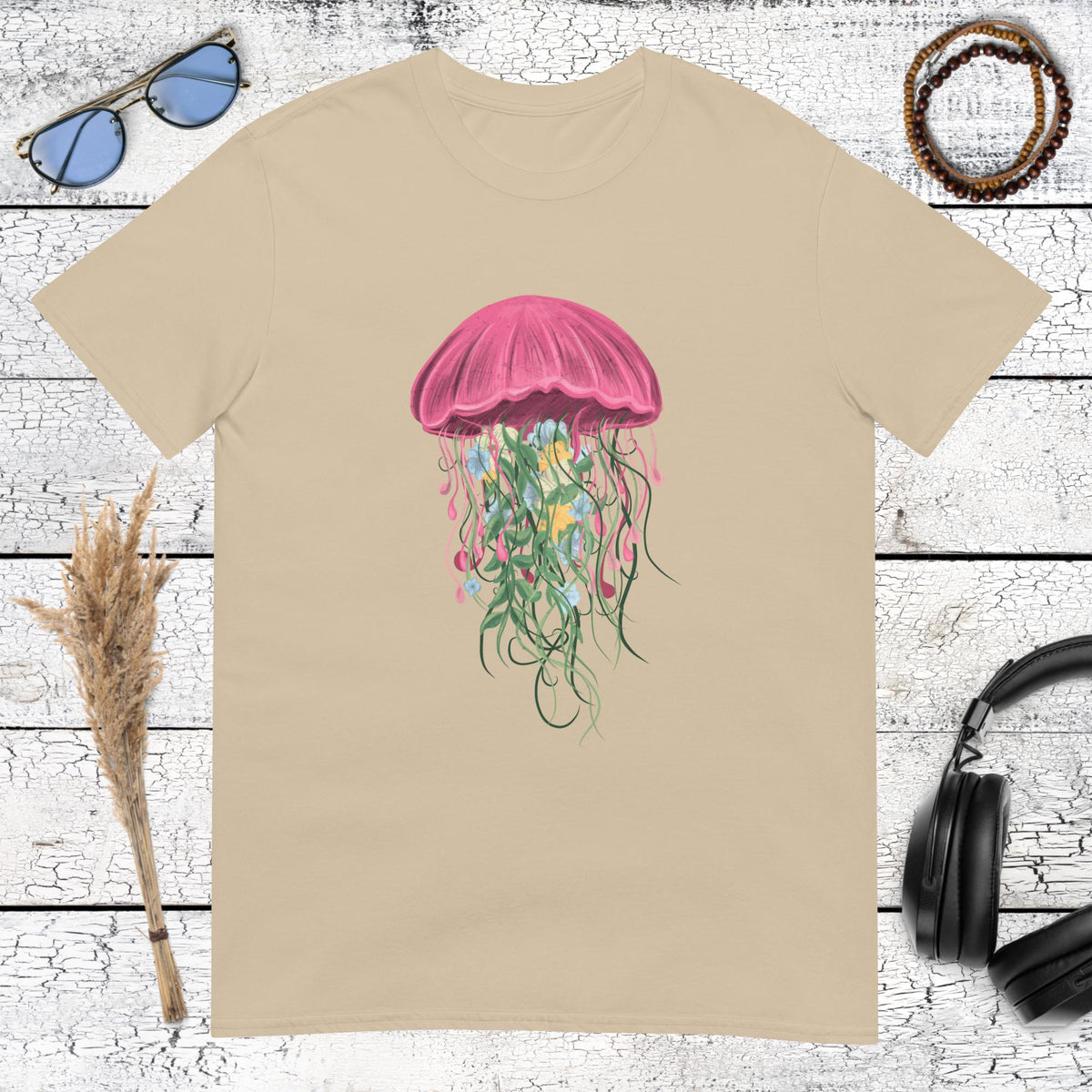 Pink and green jellyfish illustration on a sand beige cotton t-shirt