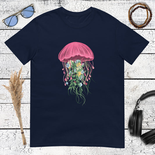 Vibrant pink and green jellyfish illustration on navy blue t-shirt