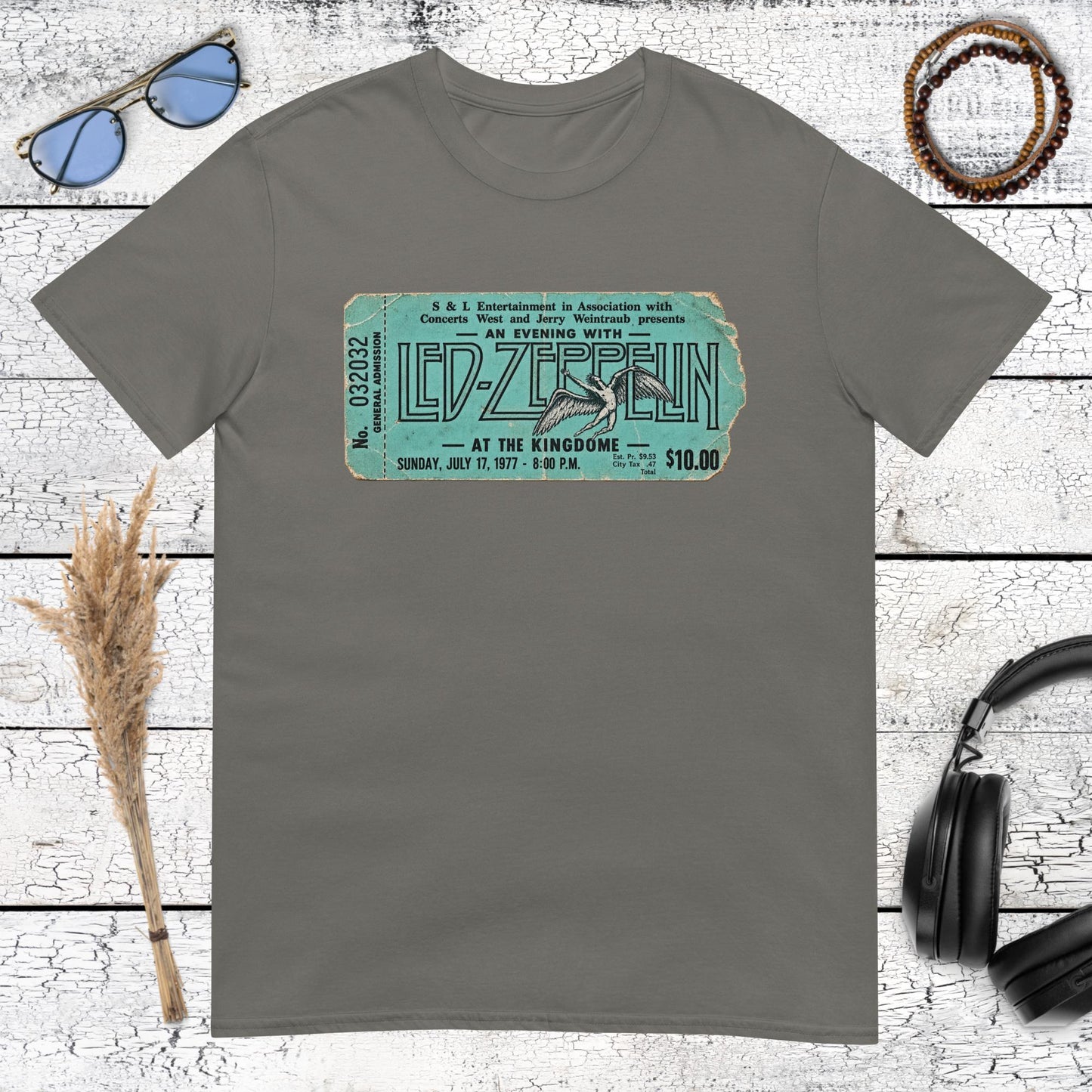 Vintage Led Zeppelin concert ticket graphic printed on a charcoal t-shirt
