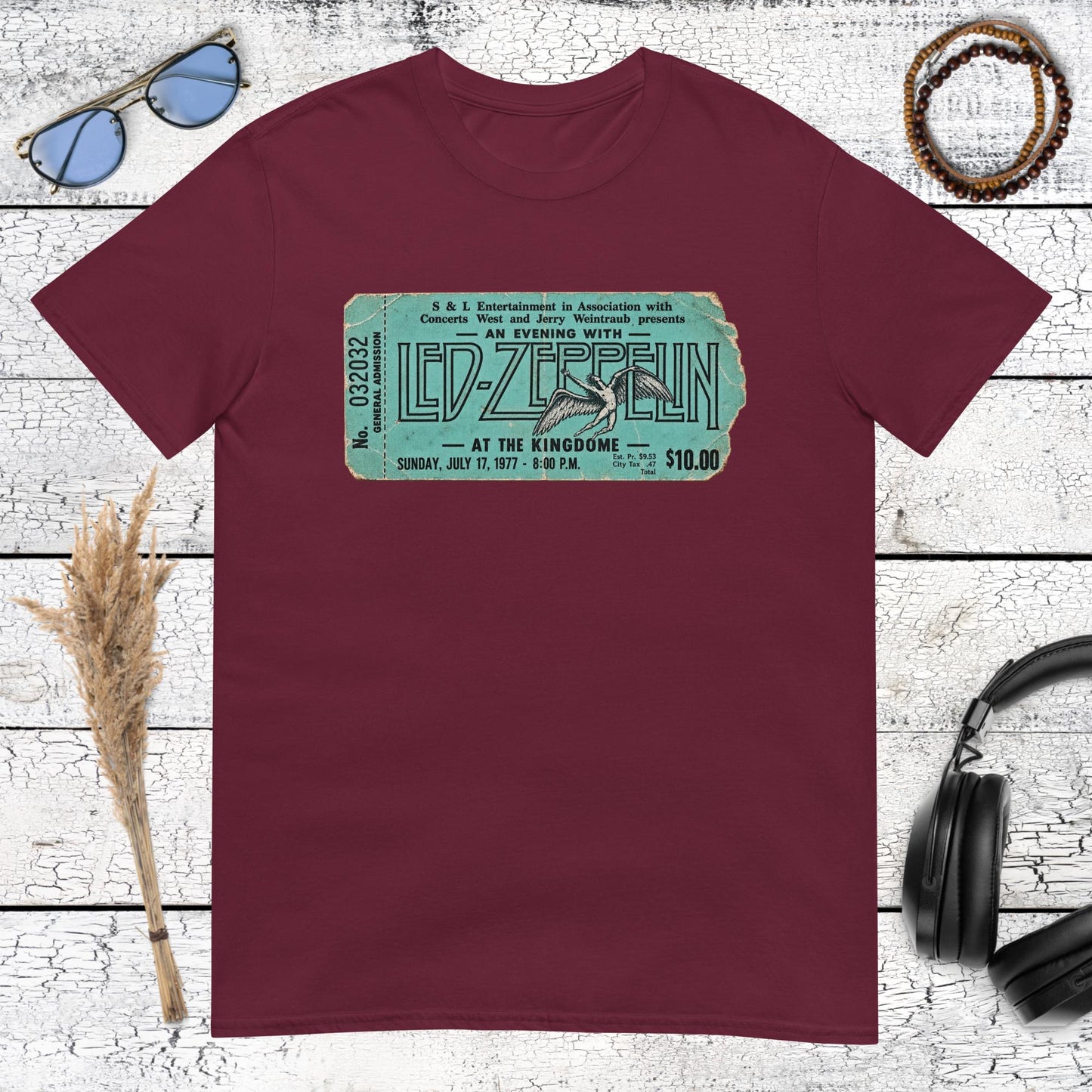 Retro Led Zeppelin concert ticket artwork printed on a maroon t-shirt