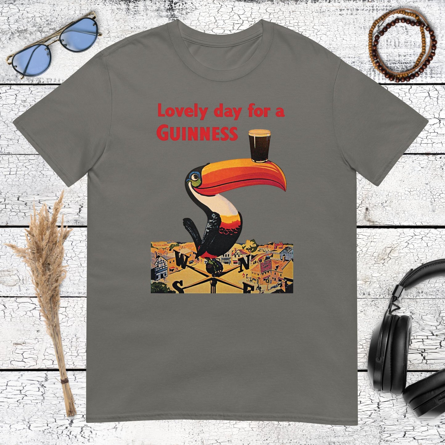 Vintage style Guinness stout advertisement art with a Guinness toucan on a charcoal t-shirt