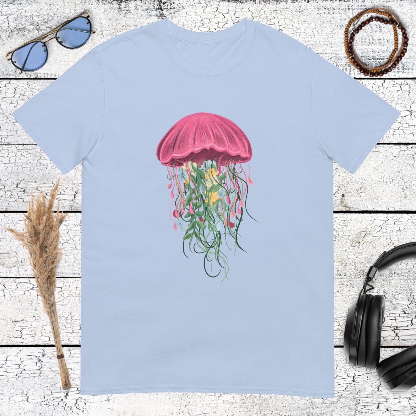 Floating jellyfish graphic art on a light blue summer aesthetic t-shirt