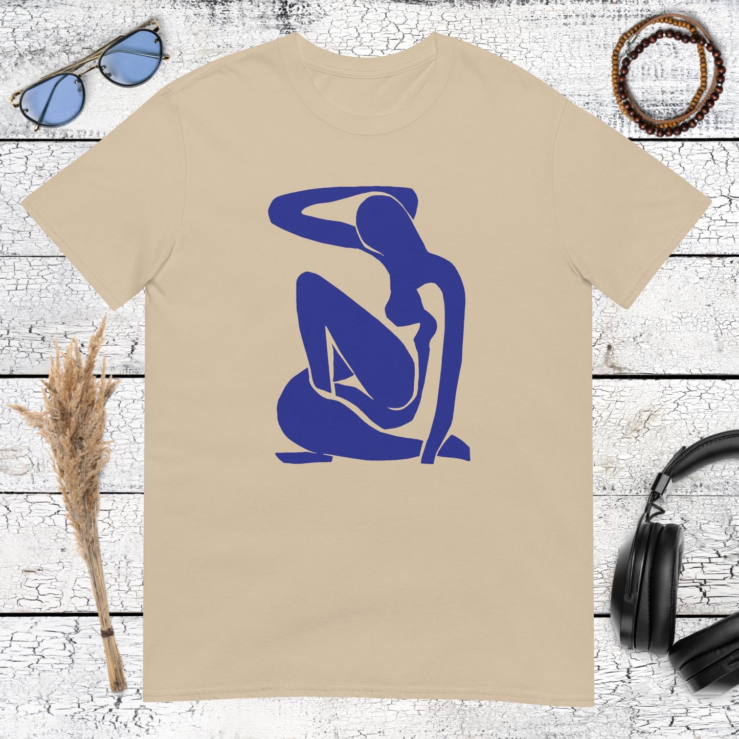 Modern blue abstract female silhouette art on a sand coloured t-shirt
