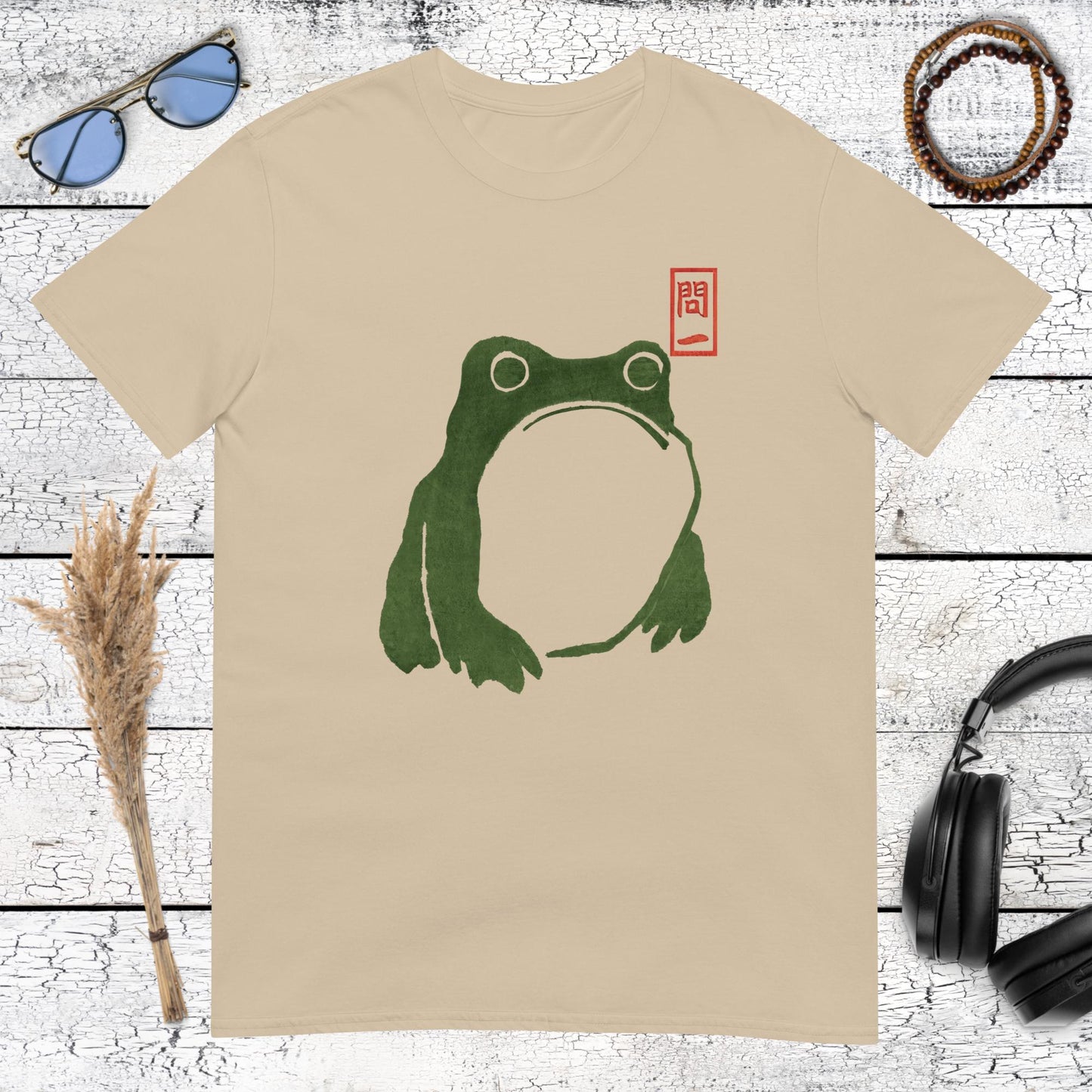 Matsumoto Hoji inspired green frog graphic on a sand coloured unisex t-shirt