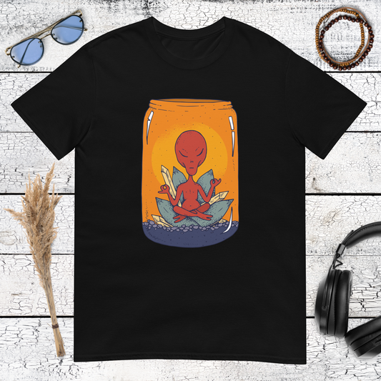 Orange sunset meditation alien in a jar graphic on black t-shirt