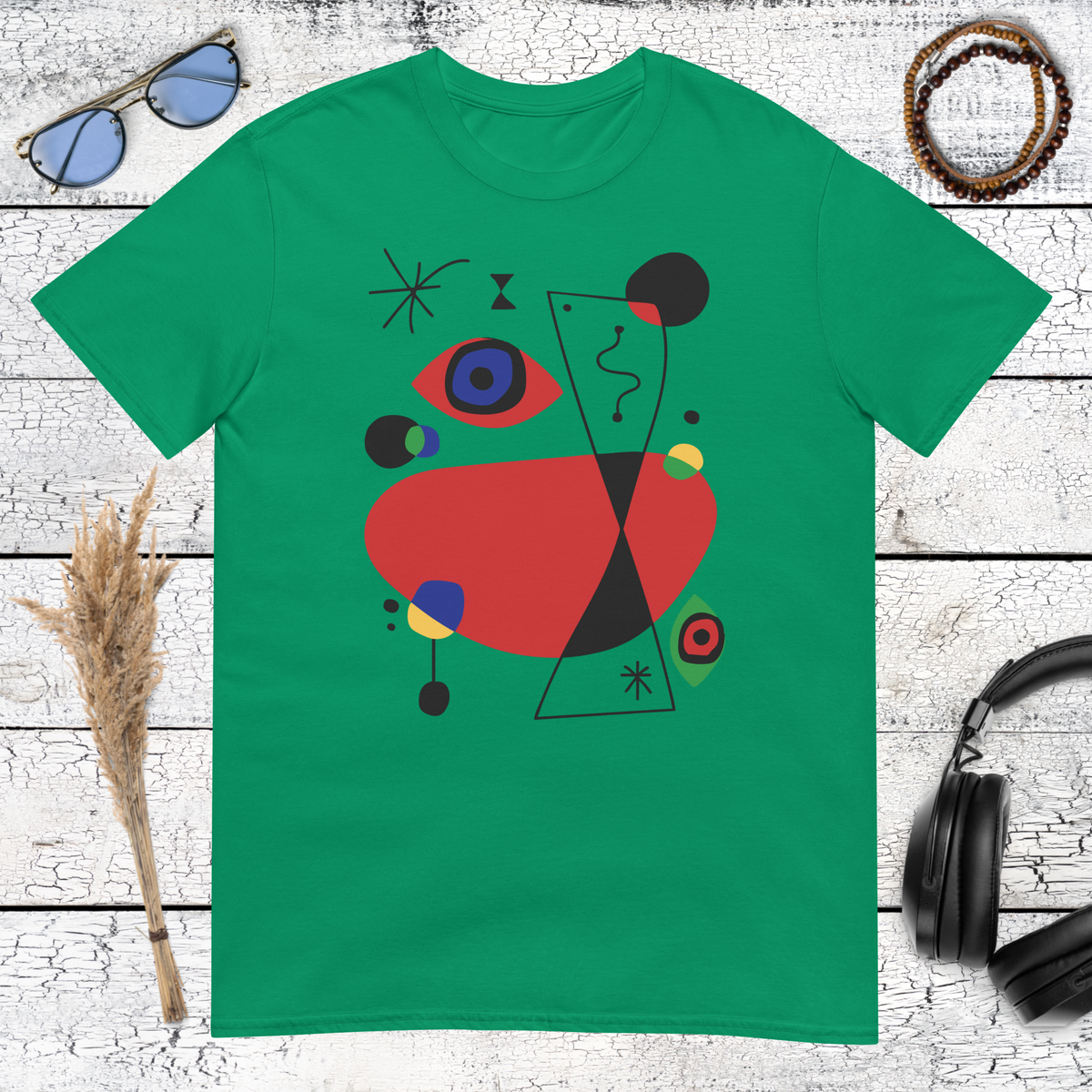 Colourful abstract geometric design inspired by Miró printed on a kelly green t-shirt