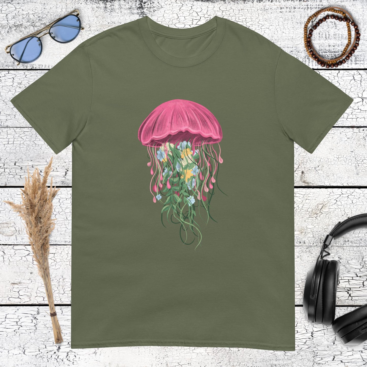Earthy green t-shirt featuring a vibrant pink jellyfish graphic