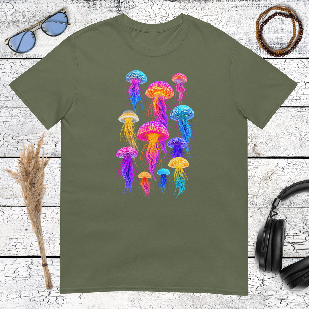 Colourful jellyfish illustration with neon-inspired details on a military green t-shirt