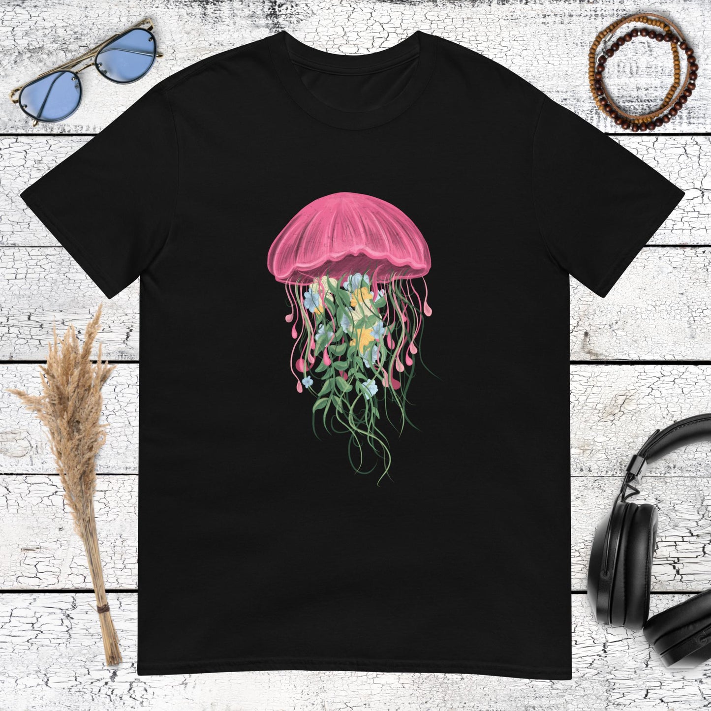 Detailed colorful jellyfish floating sea creature art on black shirt