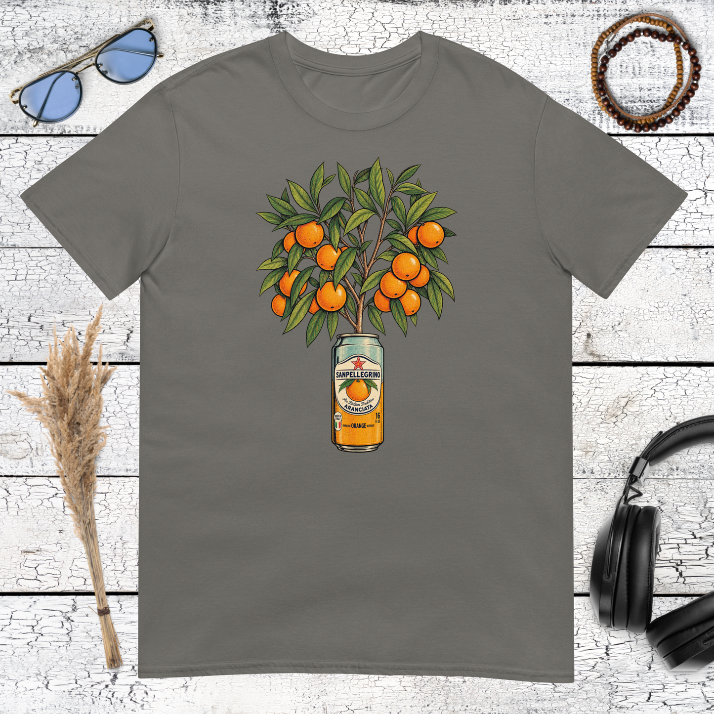 Quirky vintage orange tree illustration printed on a charcoal t-shirt