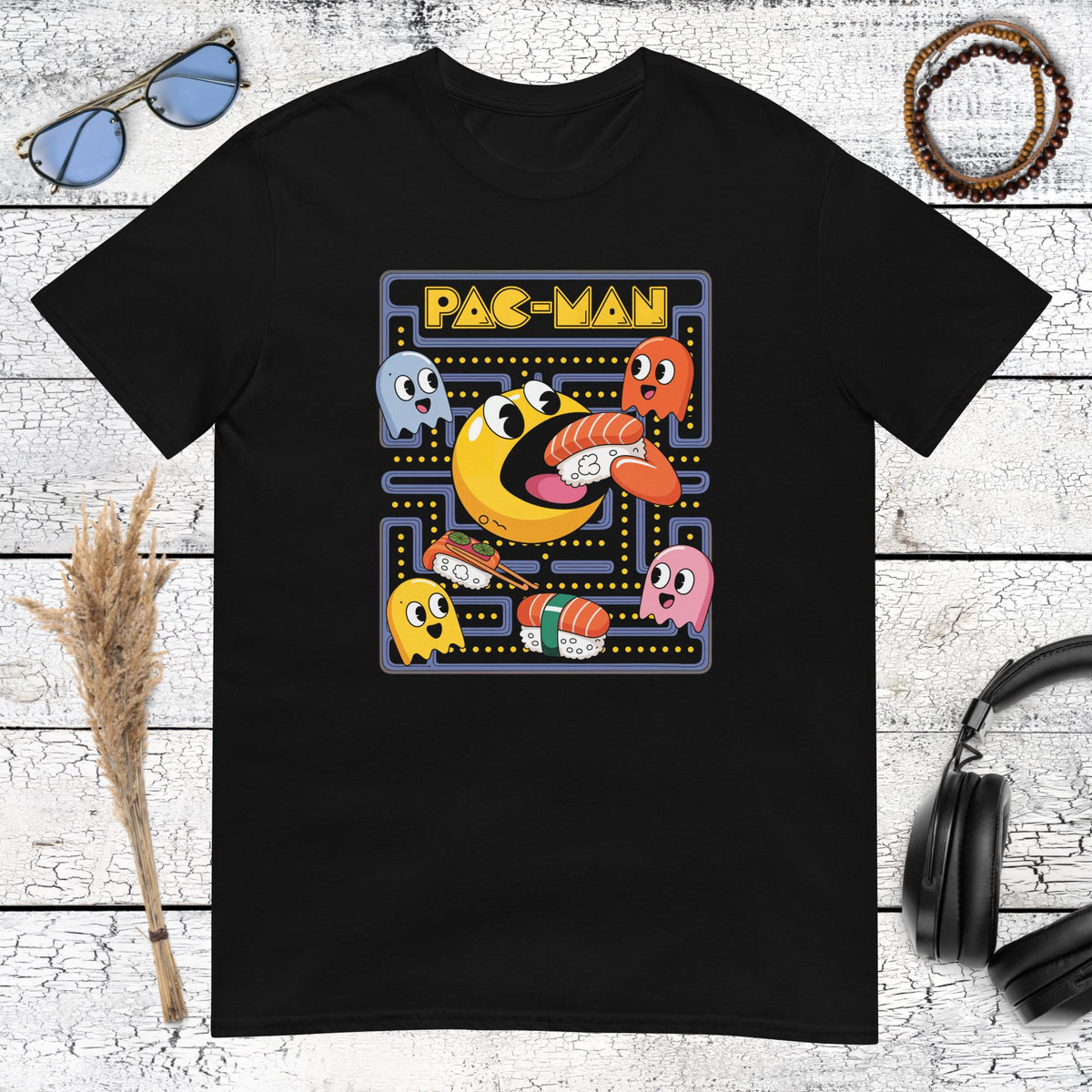 Colorful retro arcade sushi graphic printed on a black t-shirt