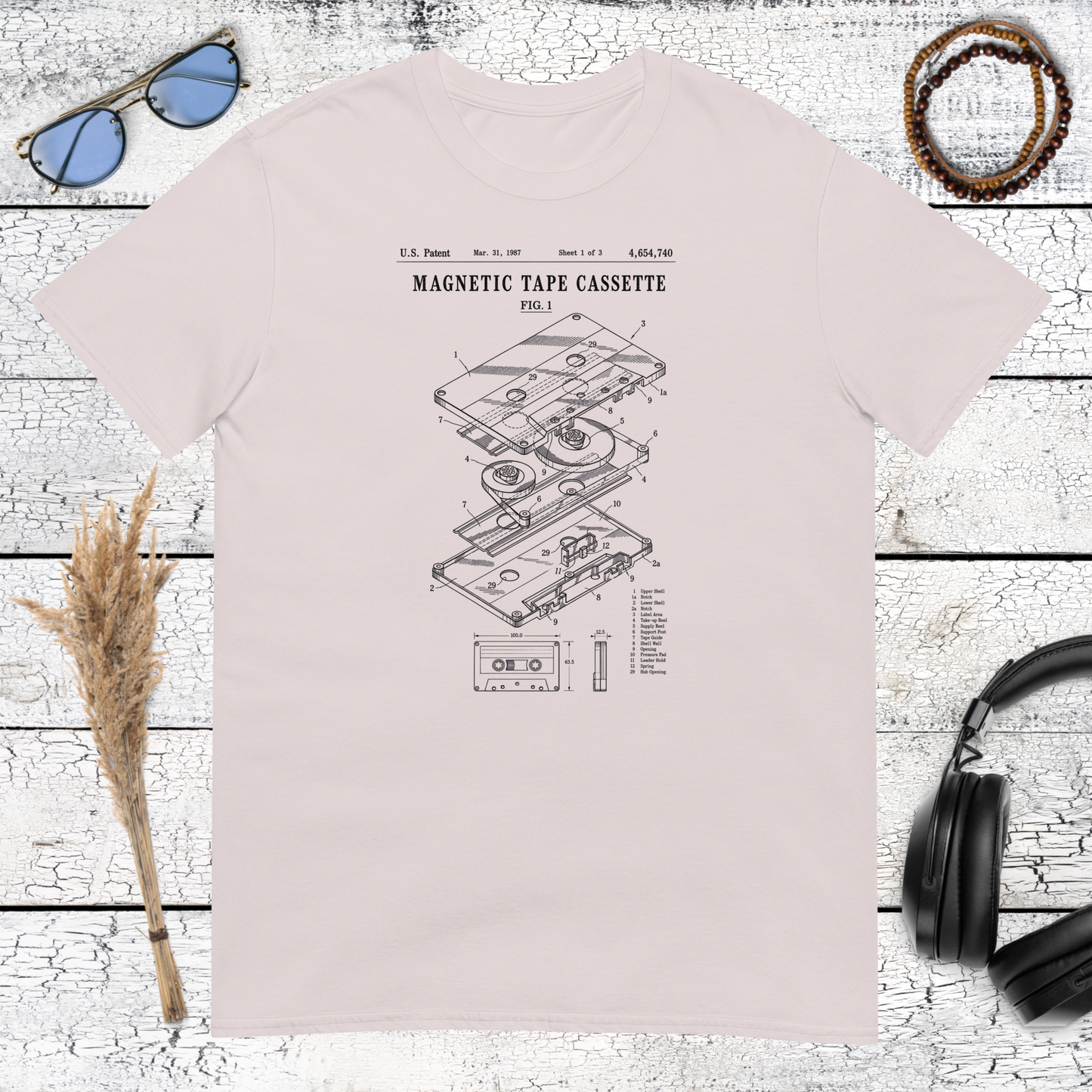 Minimal cassette tape artwork printed on an ice grey t-shirt