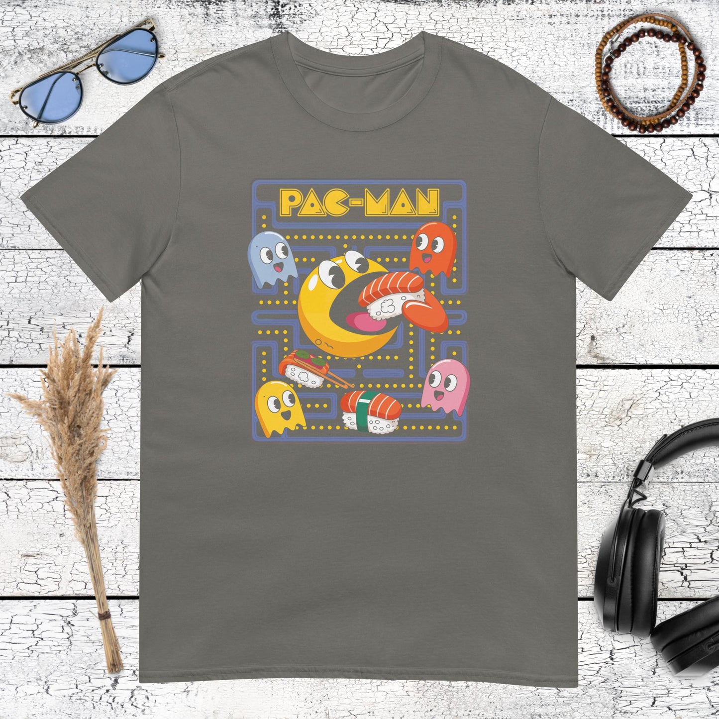 Playful sushi-inspired arcade illustration on a charcoal t-shirt