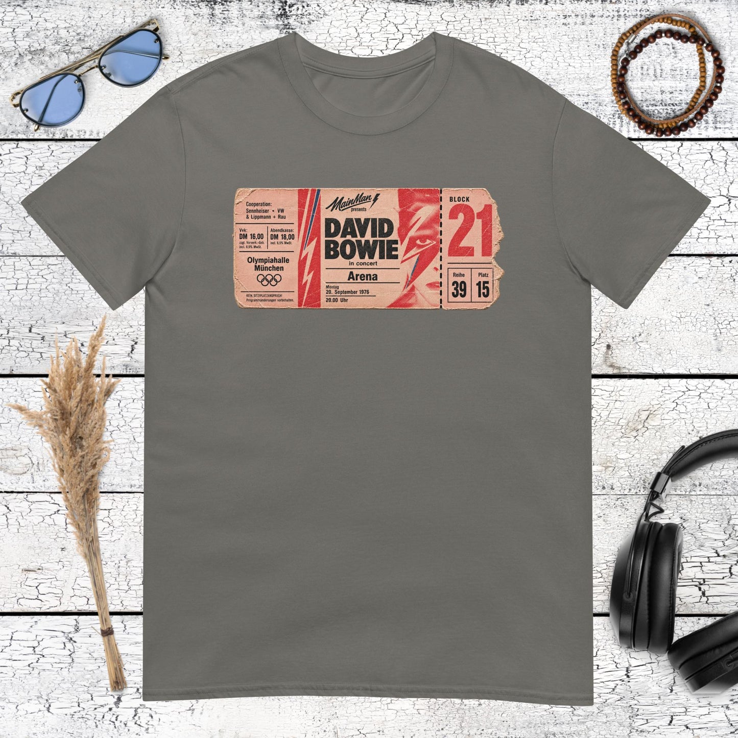 Vintage red and cream music graphic with large lettering on a charcoal t-shirt