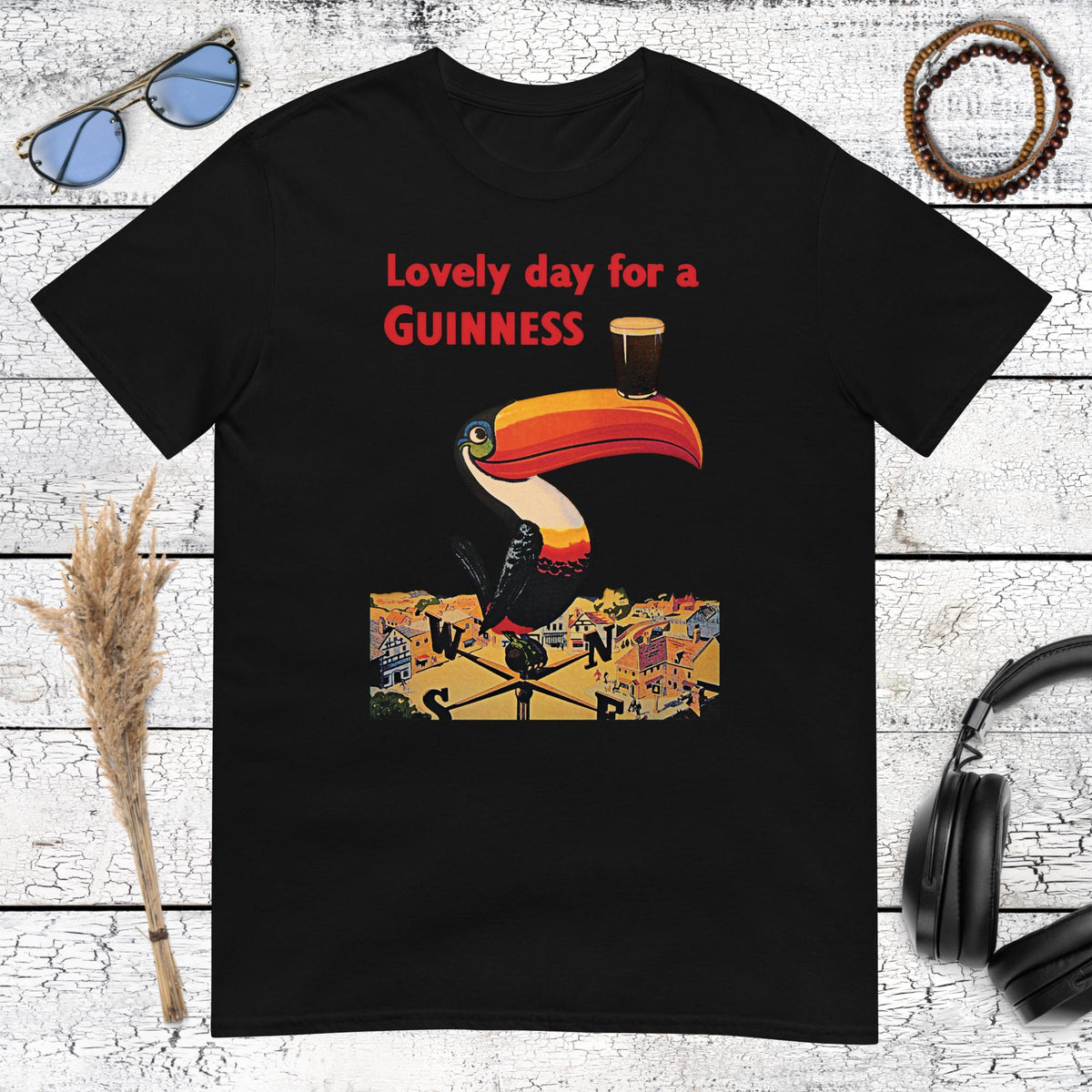 High contrast retro Guinness beer advertisement featuring the classic Guinness toucan on black tee