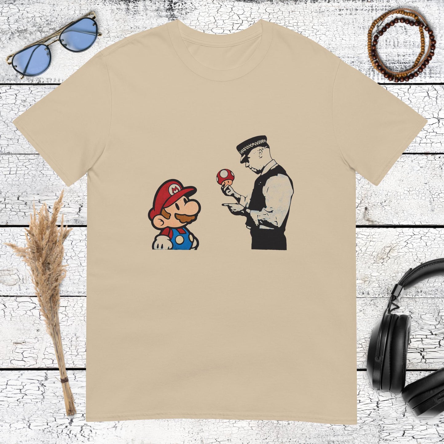 Urban graffiti style Mario graphic with a policeman on a sand coloured t-shirt