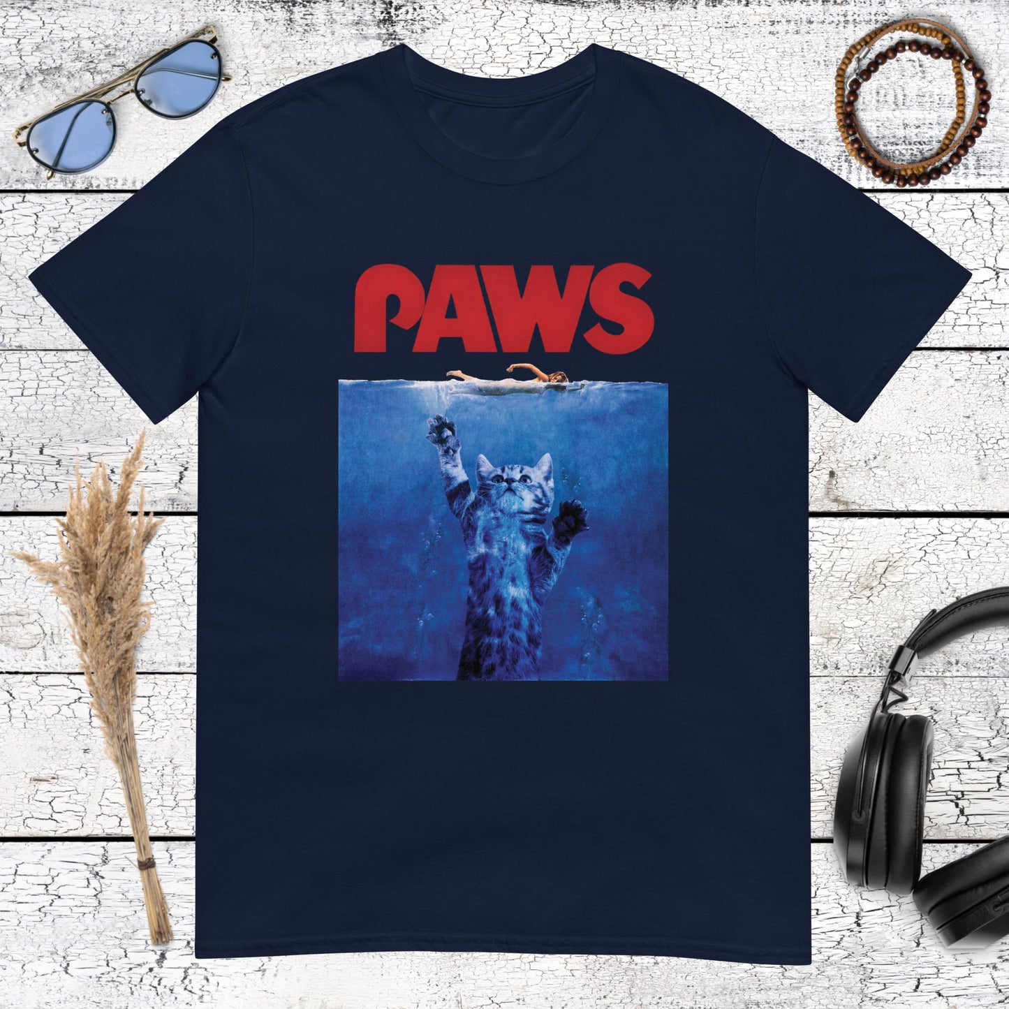 Retro PAWS animal parody design on a navy blue t-shirt